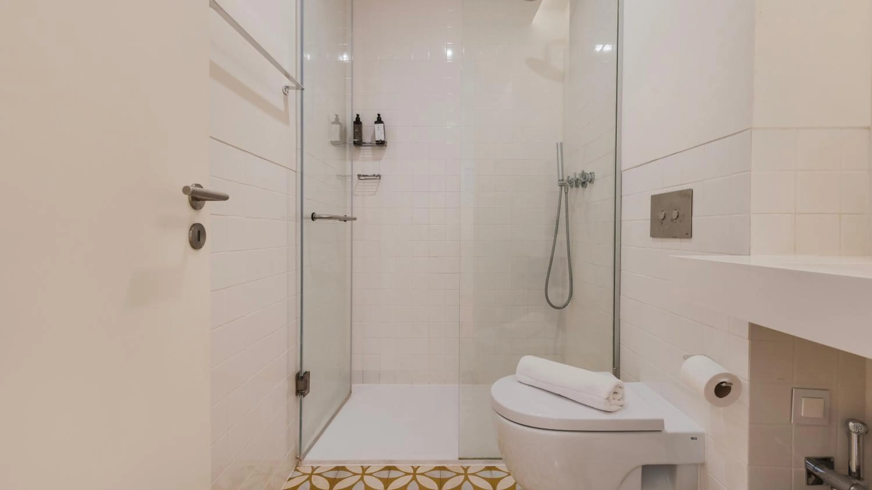 Bathroom in Downtown by the River Apartment by LovelyStay