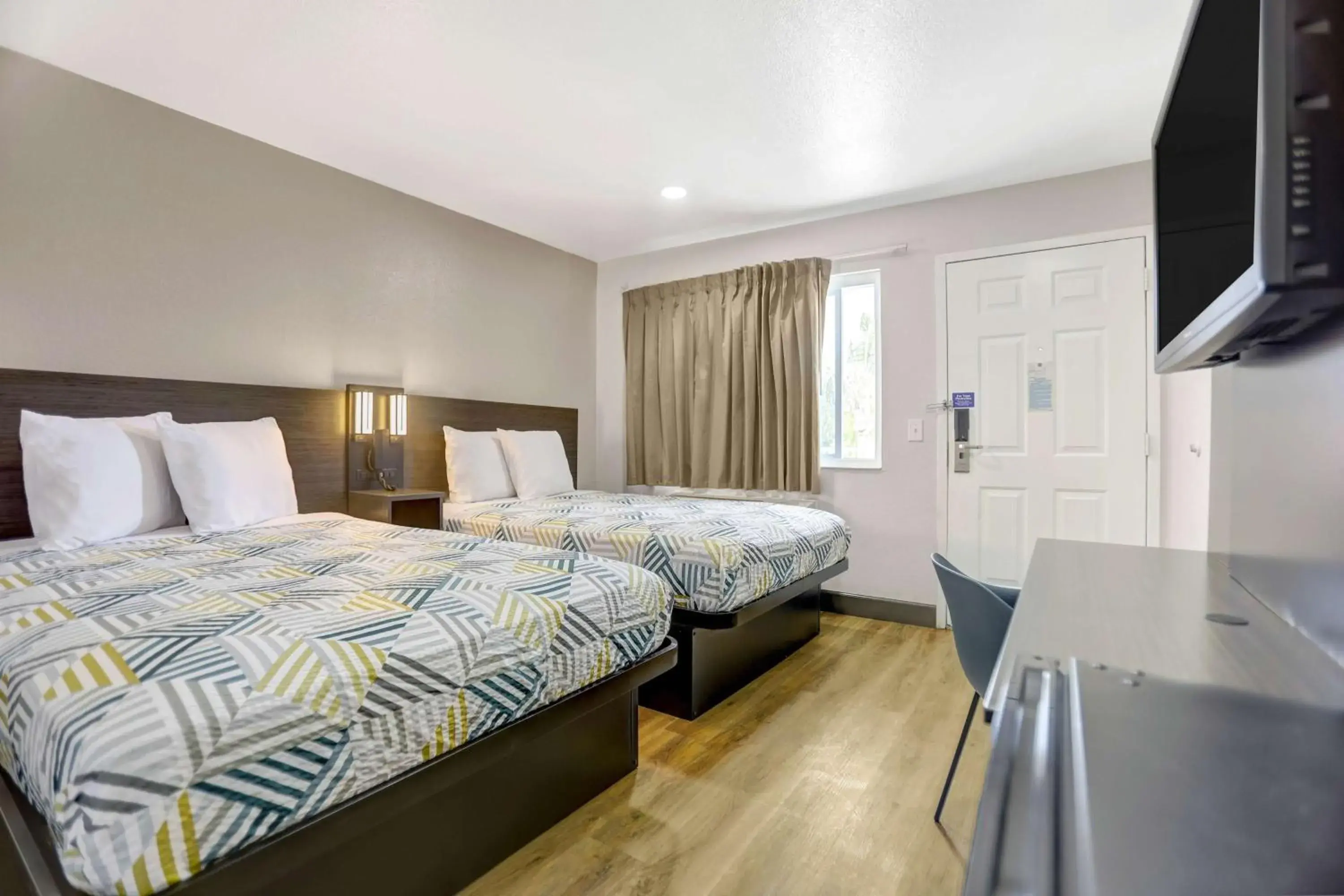 Bedroom in Motel 6 San Bernardino, CA - North