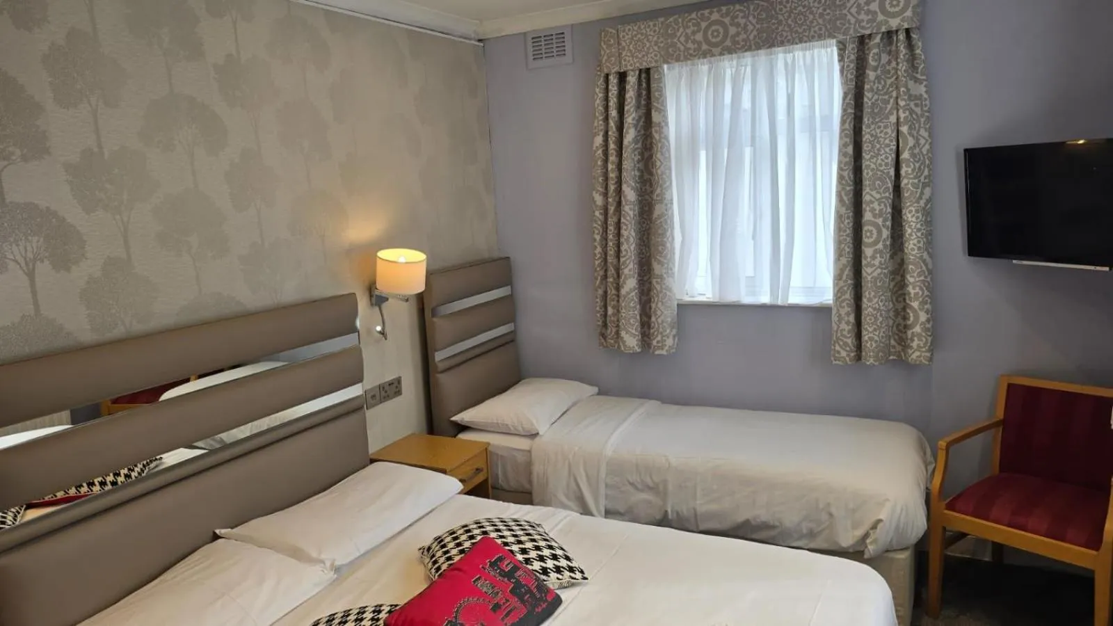 Bed in Admiral Hotel at Park Avenue