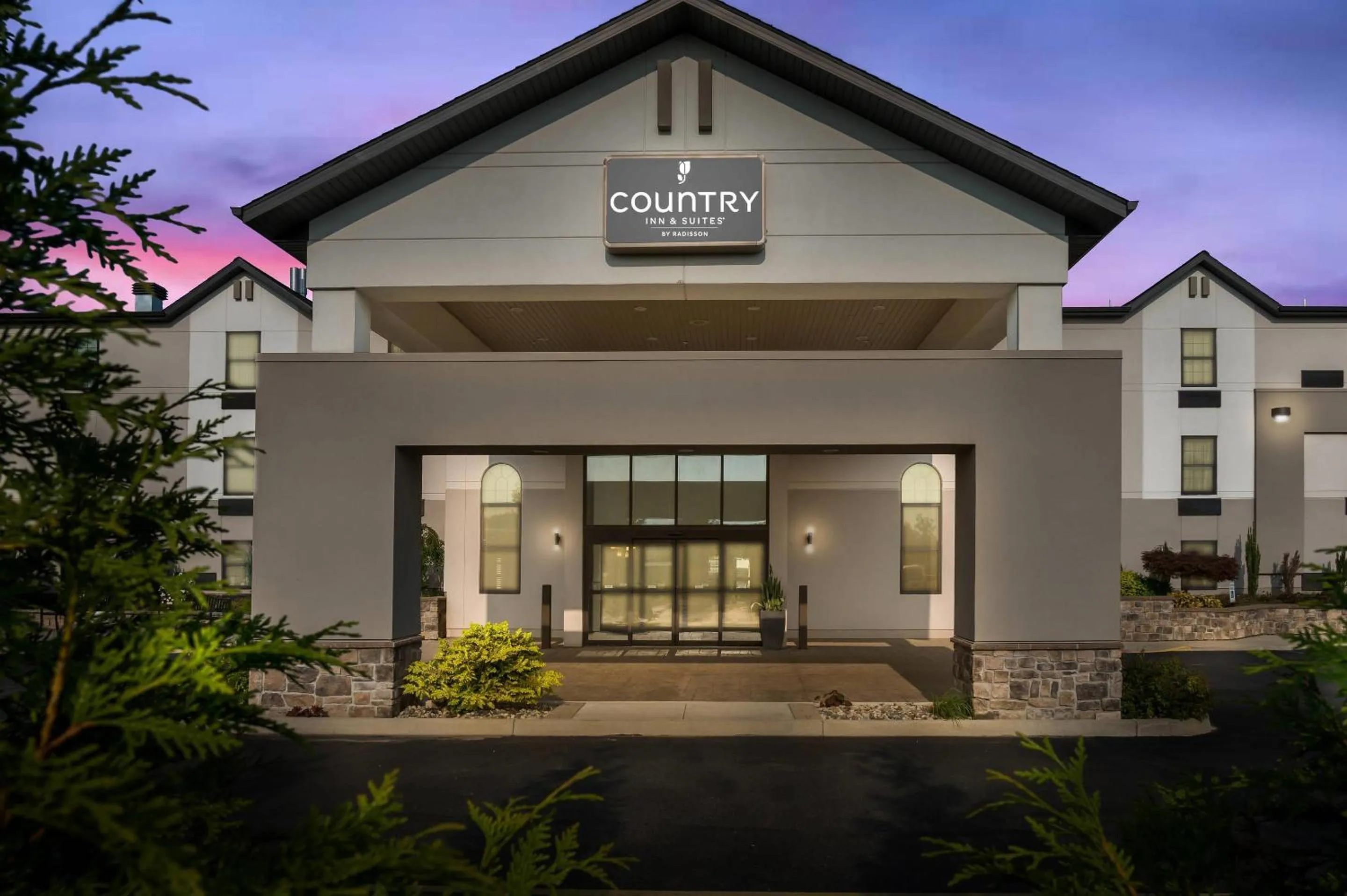 Property building in Country Inn & Suites by Radisson, Grandville-Grand Rapids West, MI