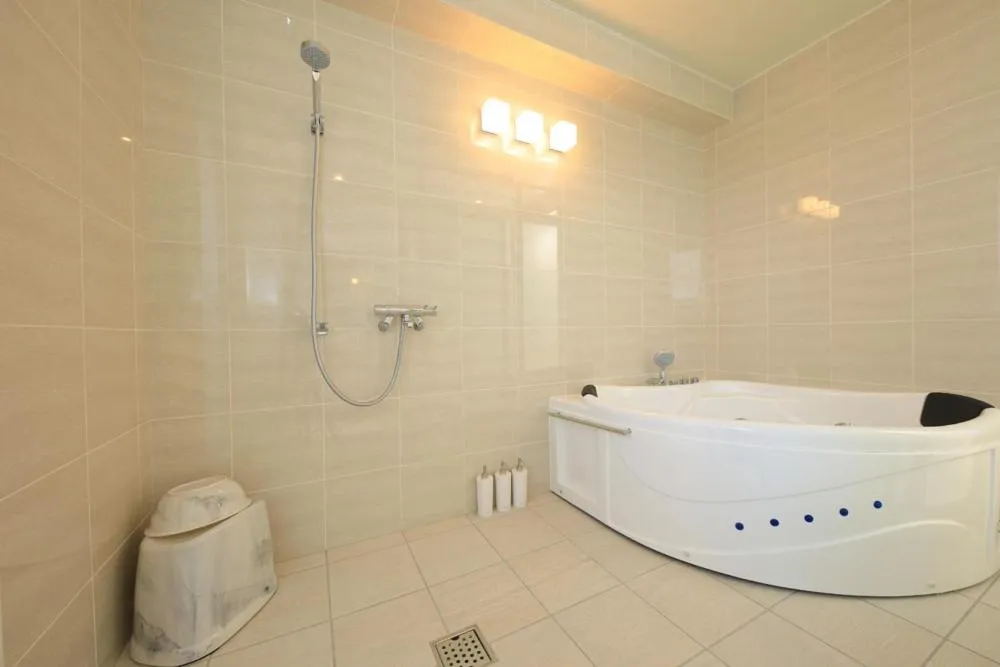 Shower in Terrace Garden Mihama Resort by Coldio Premium