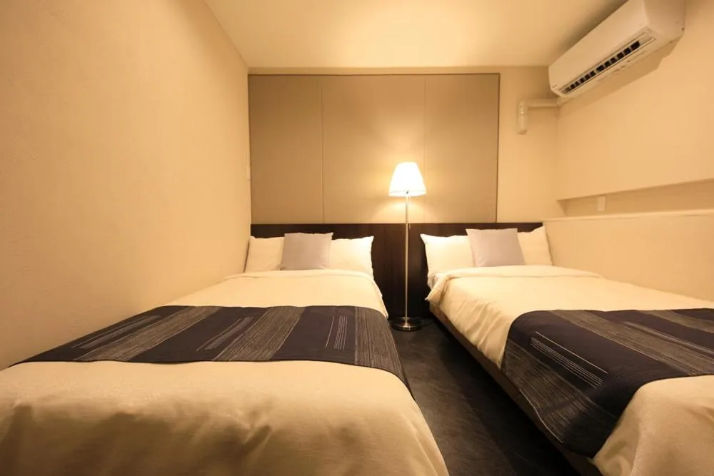 Bed in Terrace Garden Mihama Resort by Coldio Premium