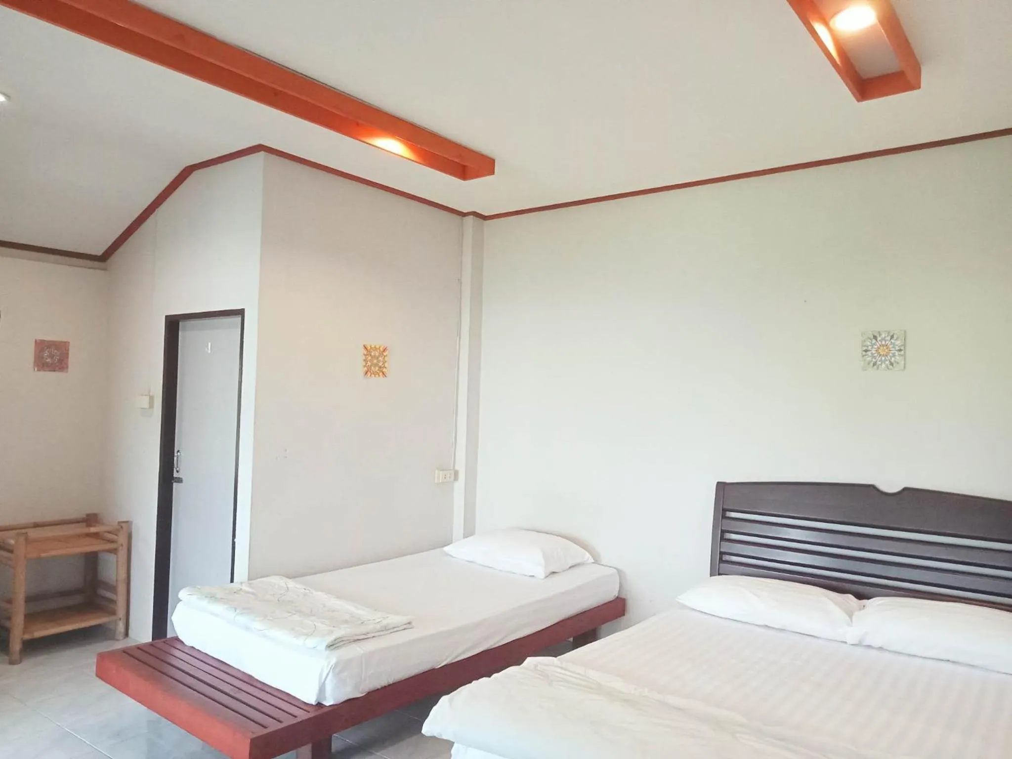 Bed in The Ocean Phangan Homestay