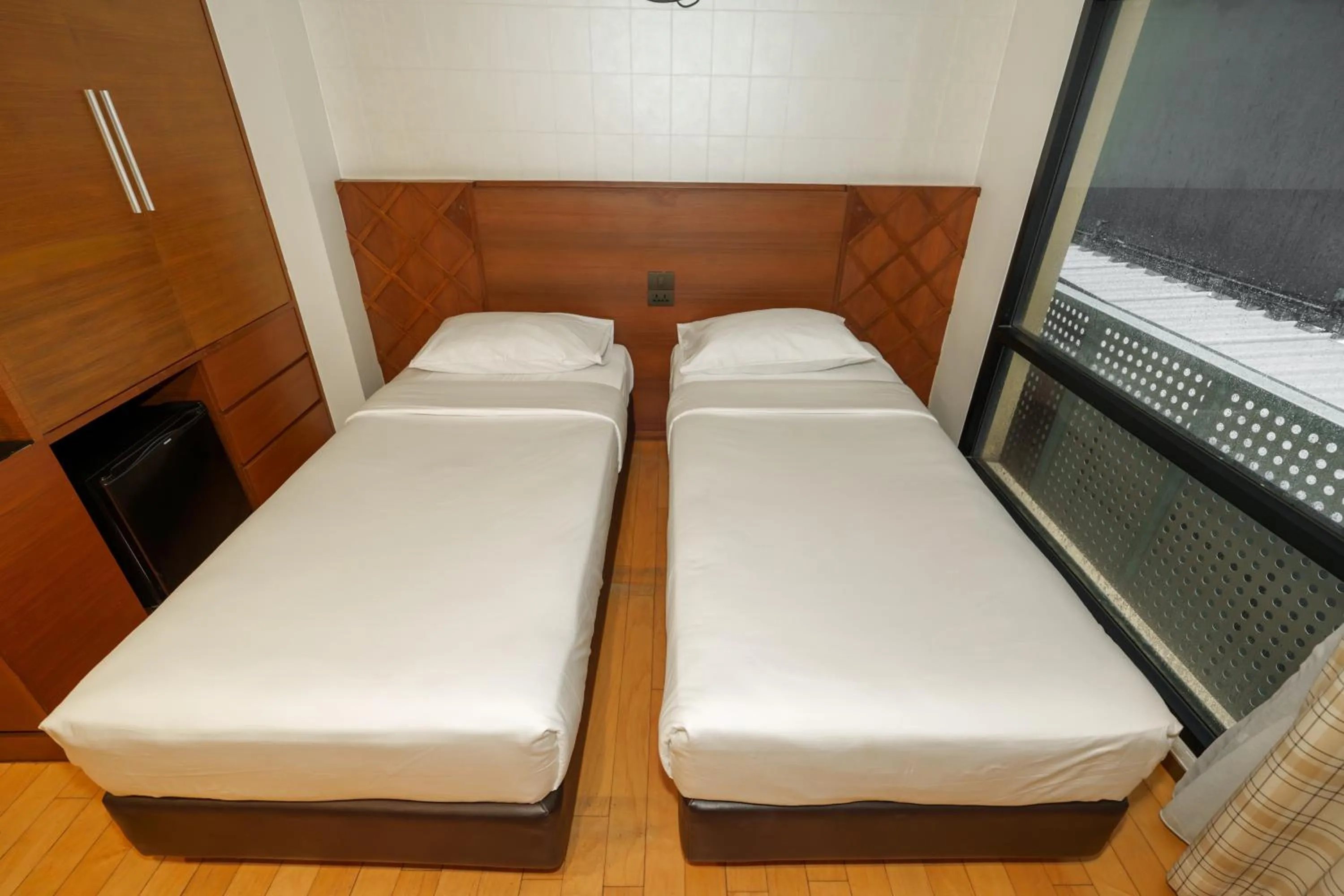 Bed in Marvin Suites Hotel