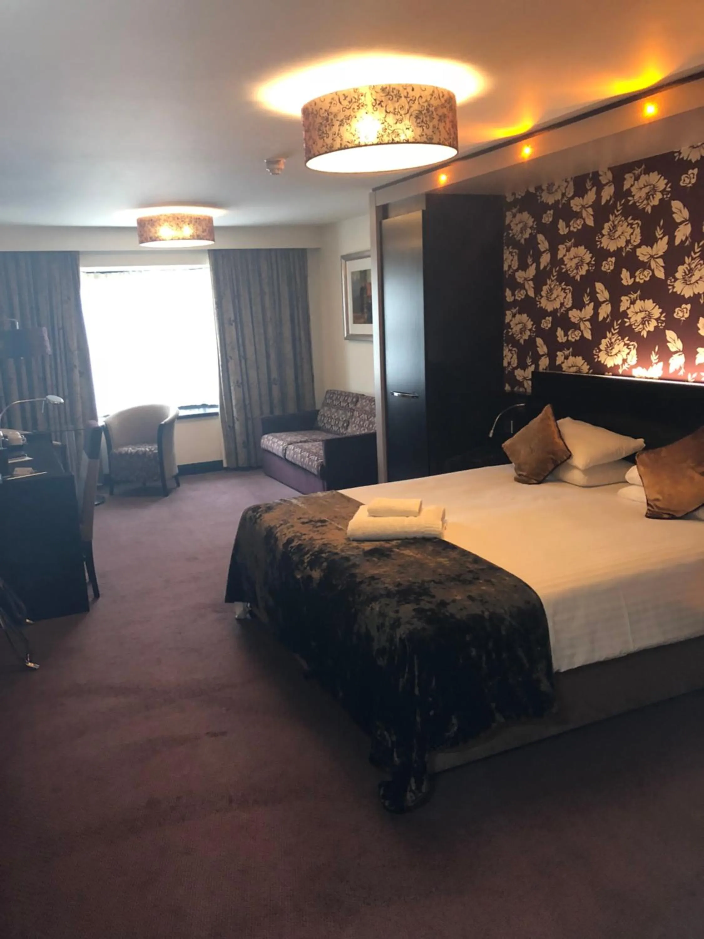 Bed in The BlueBell Hotel