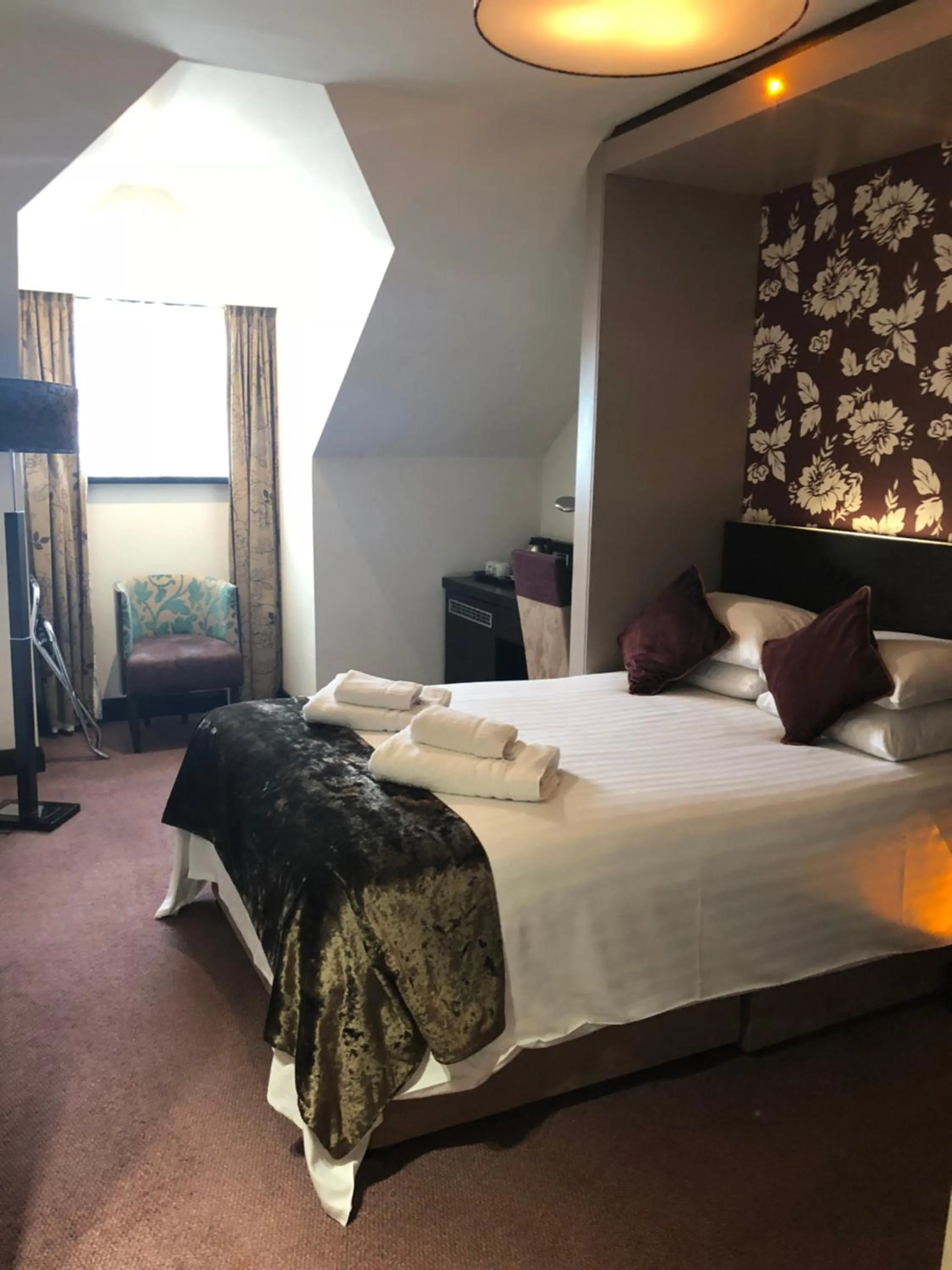 Bed in The BlueBell Hotel