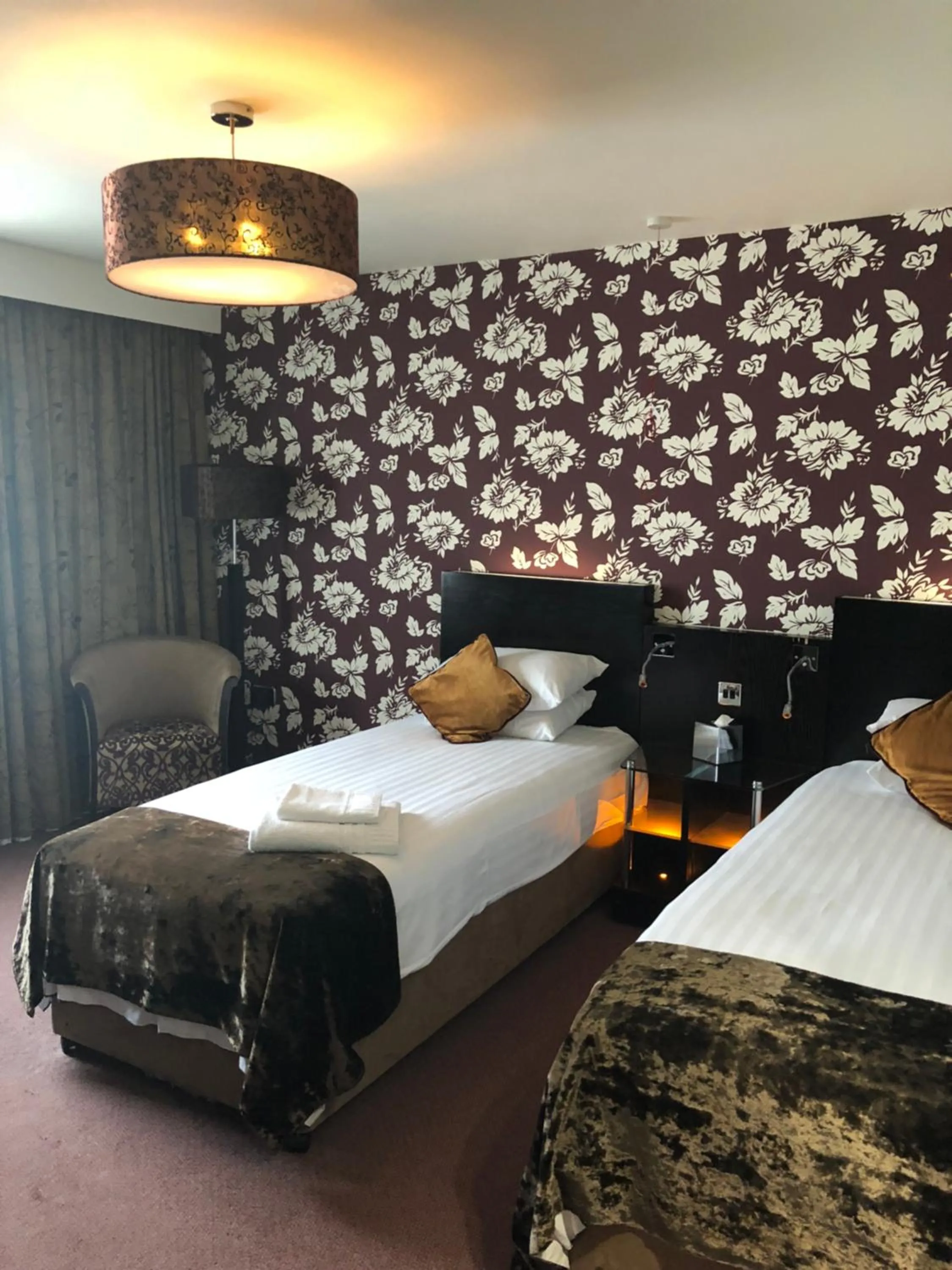 Bed in The BlueBell Hotel