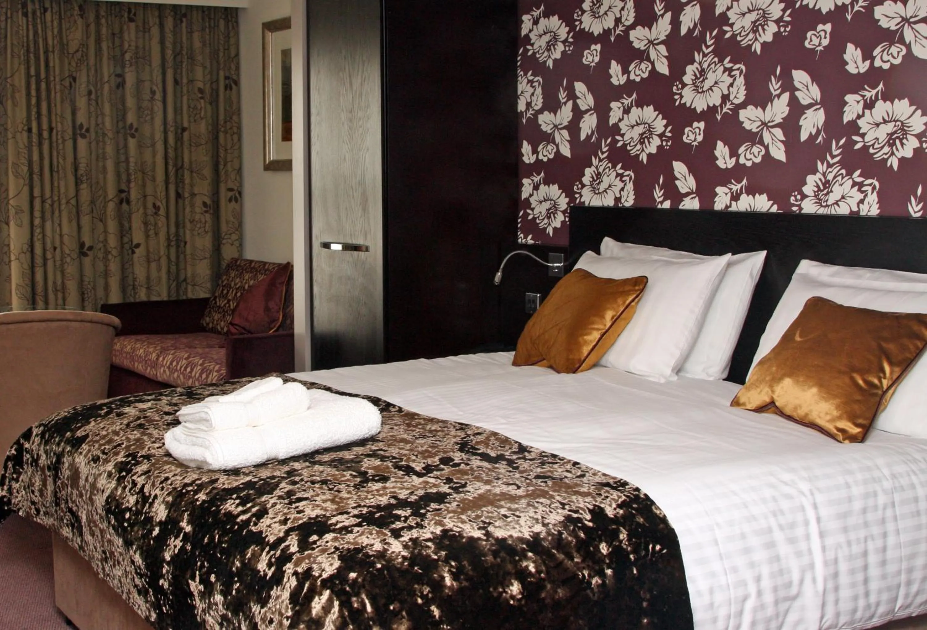 Bed in The BlueBell Hotel