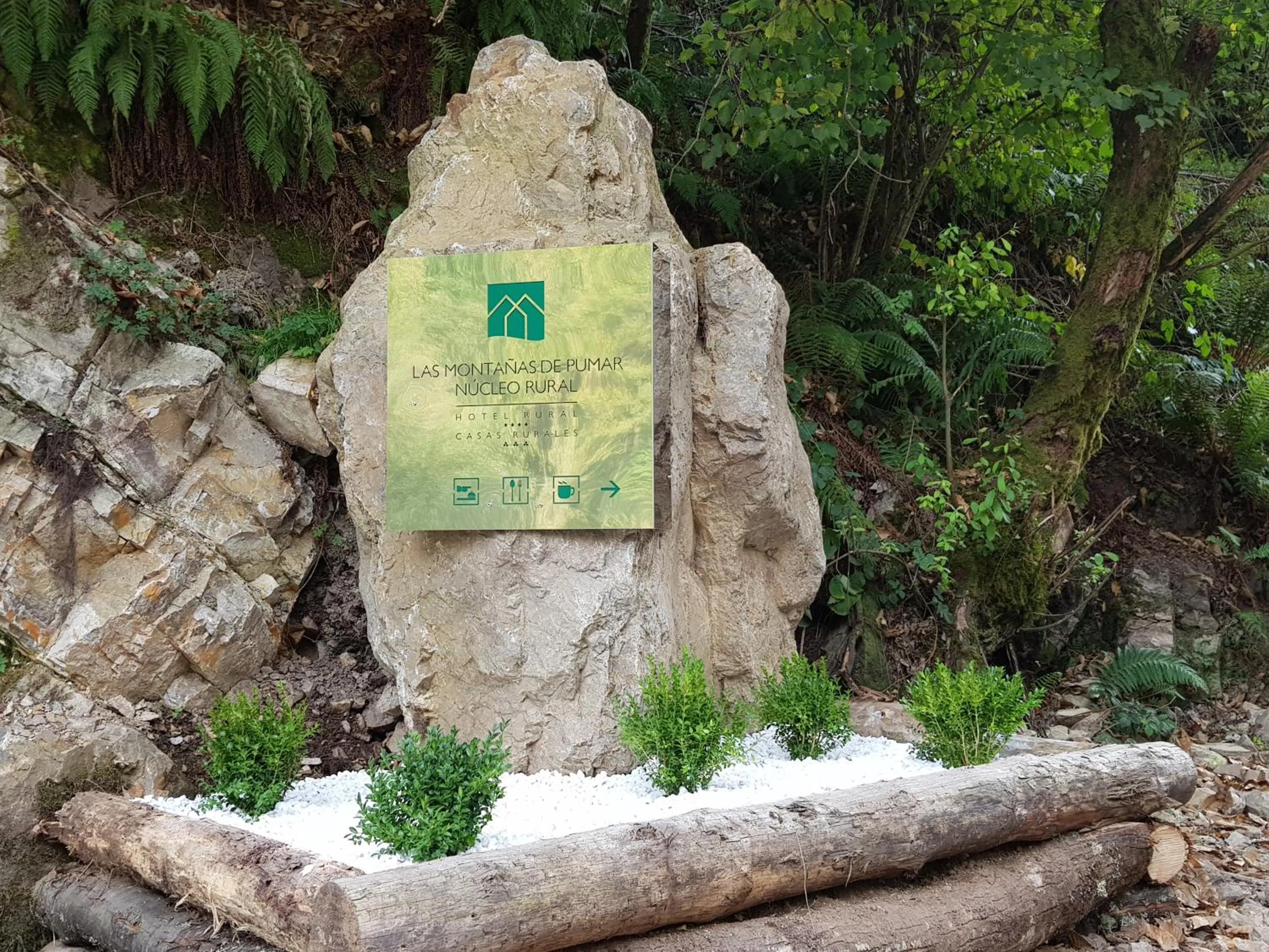 Property logo or sign in Hotel Rural Las Montañas de Pumar