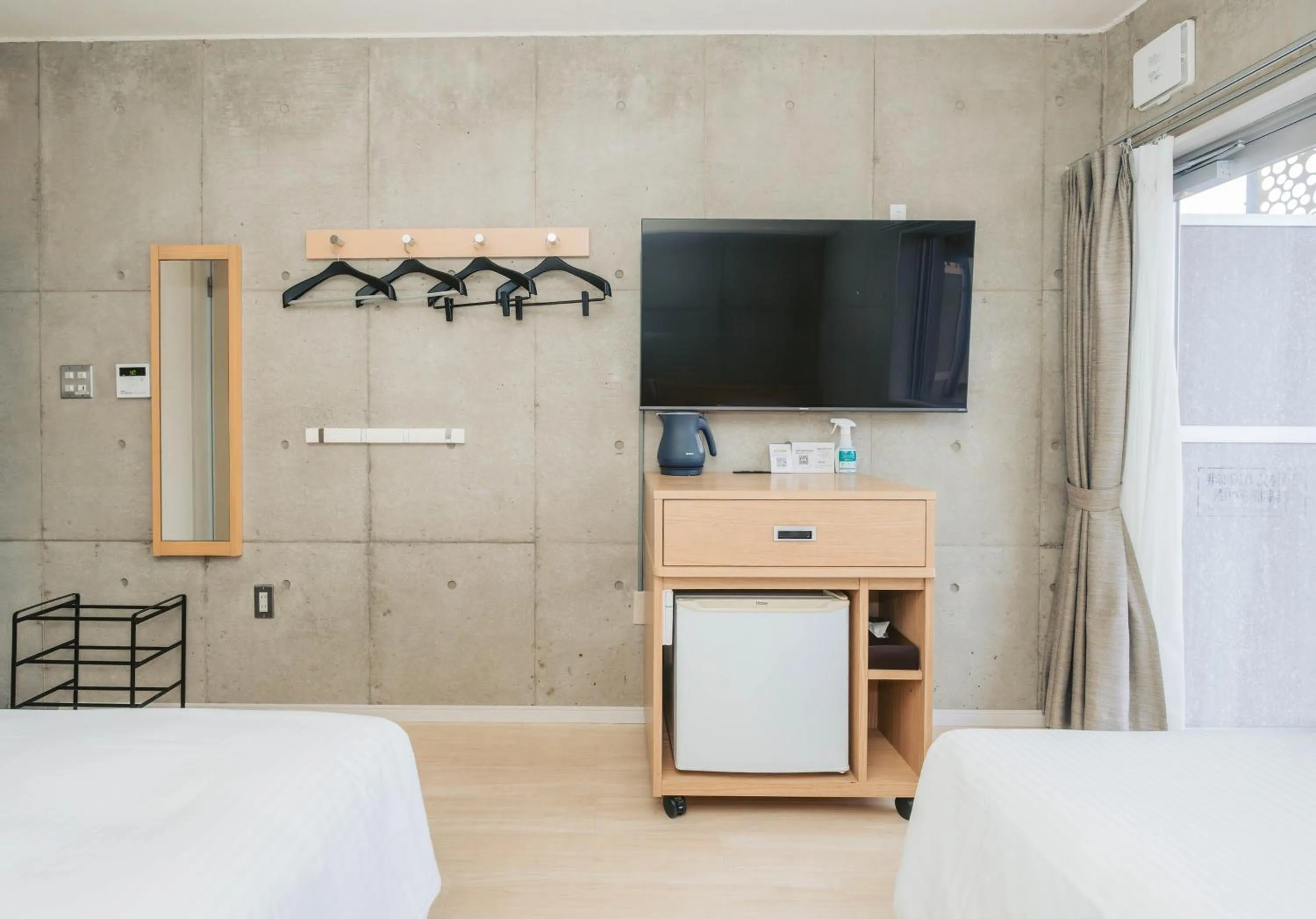 Photo of the whole room, Bed in The BREAKFAST HOTEL MARCHE Ishigaki Island