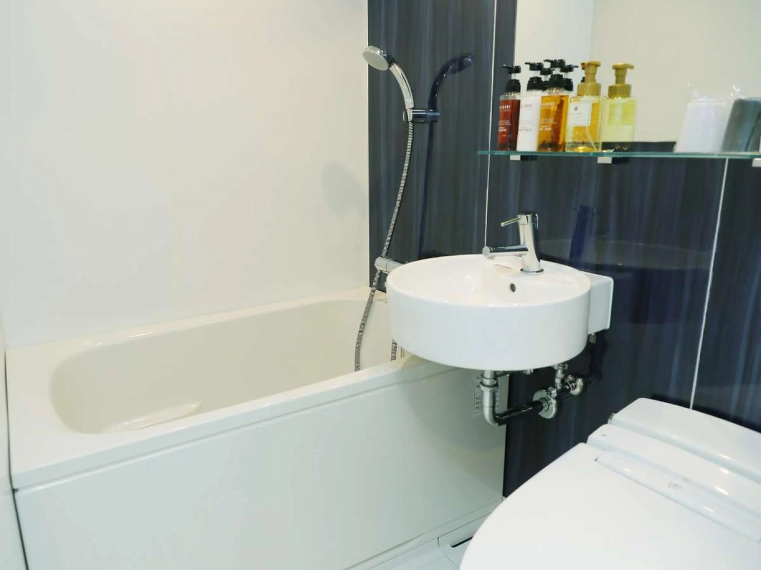 Bathroom, Bed in The BREAKFAST HOTEL MARCHE Ishigaki Island