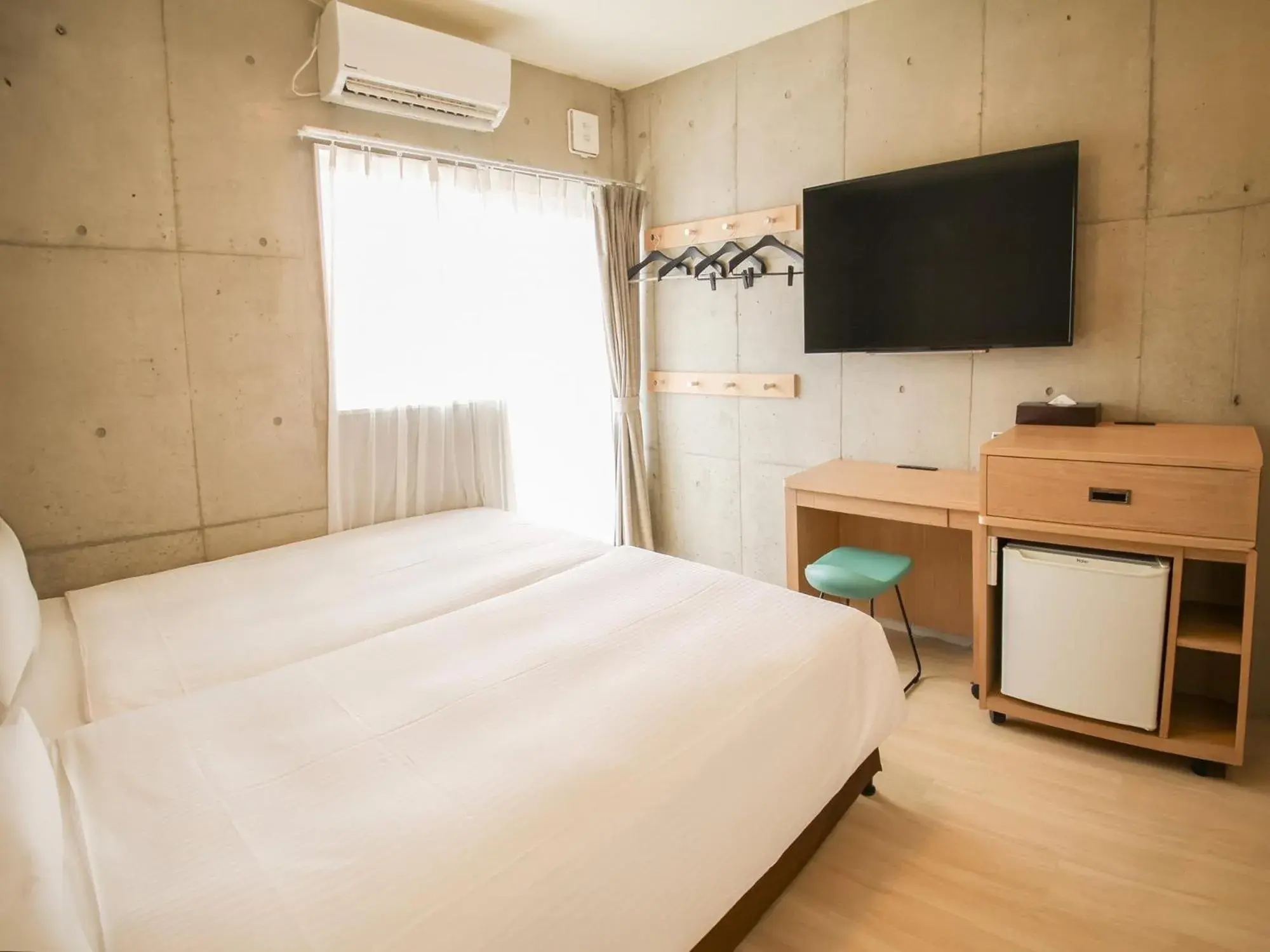 Photo of the whole room, Bed in The BREAKFAST HOTEL MARCHE Ishigaki Island Photo of the whole room, Bed in The BREAKFAST HOTEL MARCHE Ishigaki Island