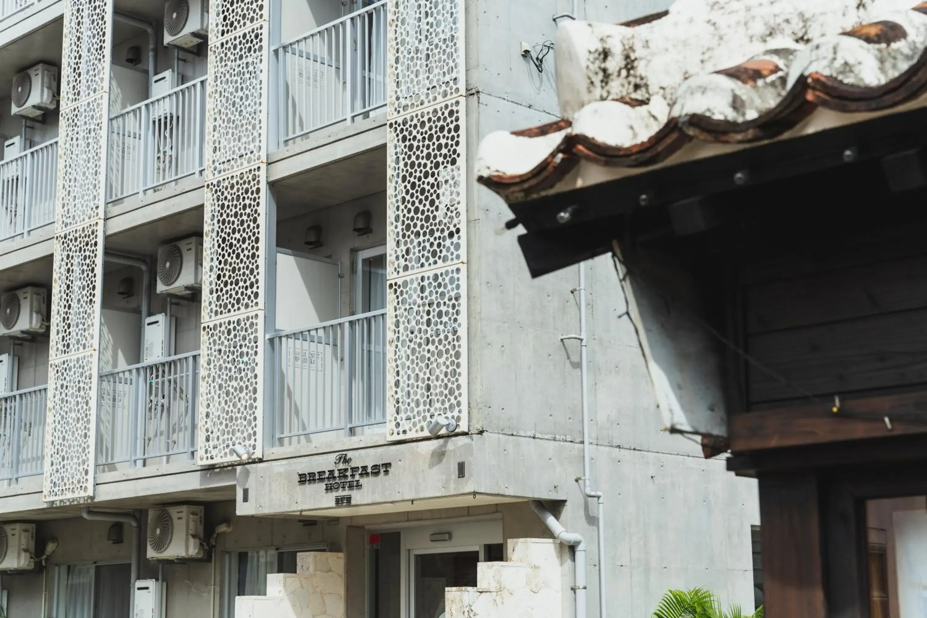 Facade/entrance in The BREAKFAST HOTEL MARCHE Ishigaki Island Facade/entrance in The BREAKFAST HOTEL MARCHE Ishigaki Island