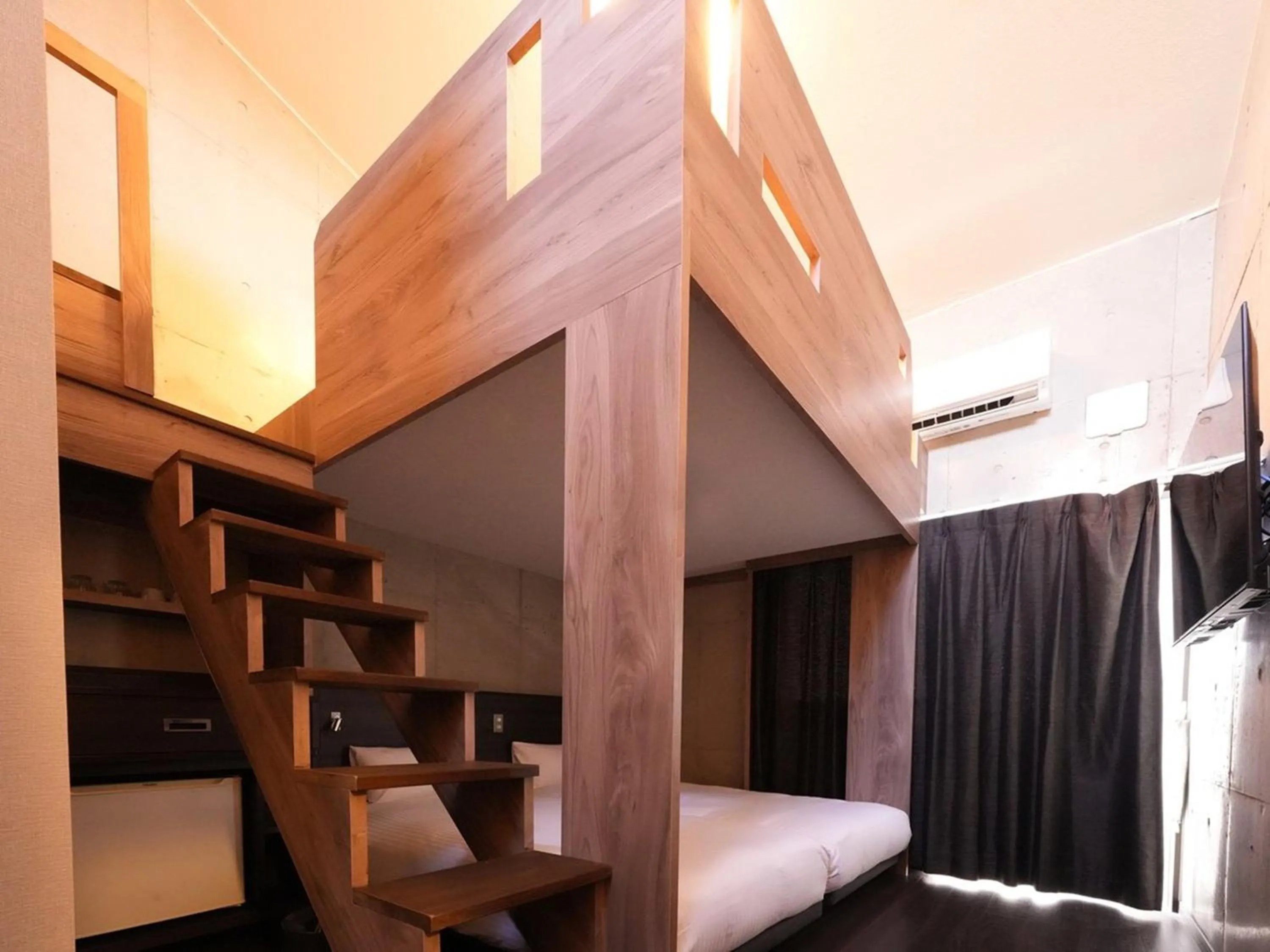 Photo of the whole room, Bed in The BREAKFAST HOTEL MARCHE Ishigaki Island