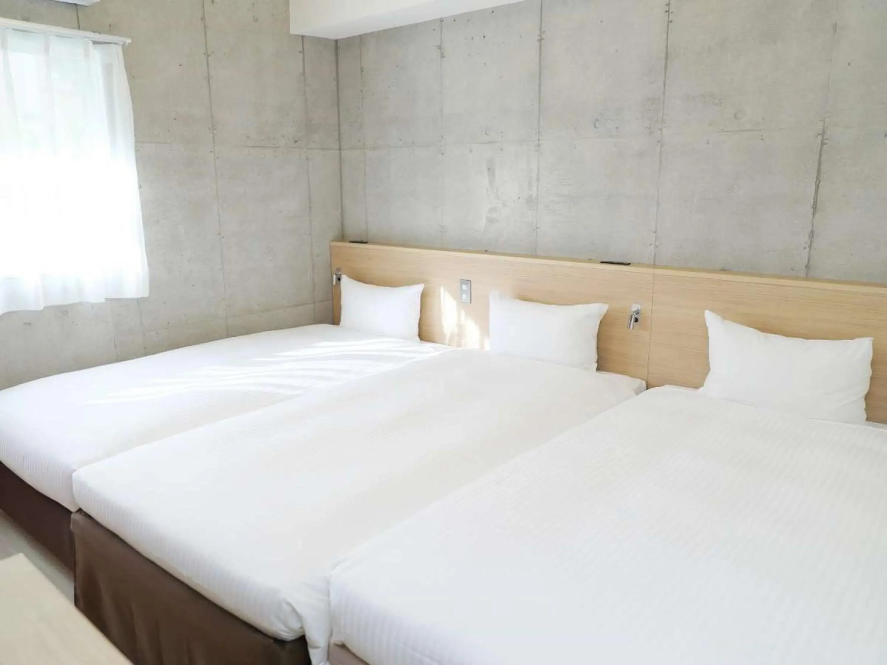 Photo of the whole room, Bed in The BREAKFAST HOTEL MARCHE Ishigaki Island Photo of the whole room, Bed in The BREAKFAST HOTEL MARCHE Ishigaki Island