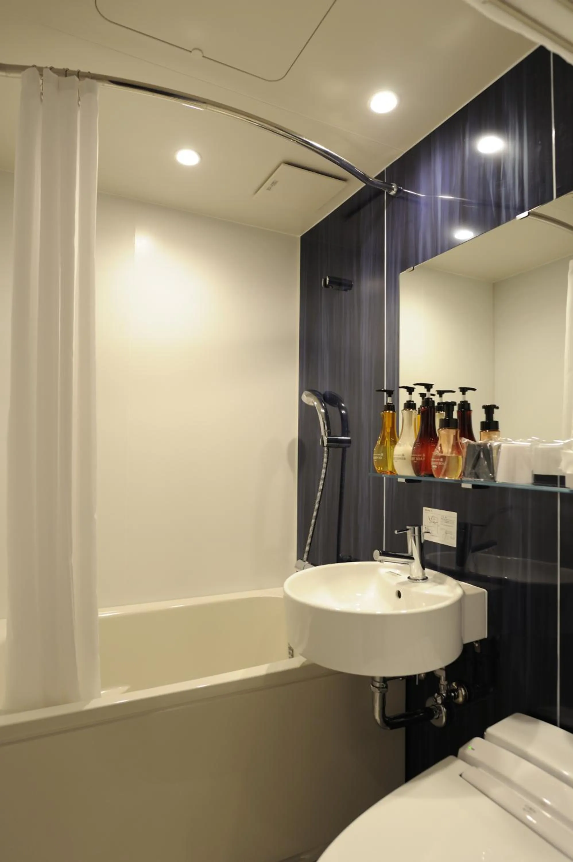 Toilet, Bed in The BREAKFAST HOTEL MARCHE Ishigaki Island