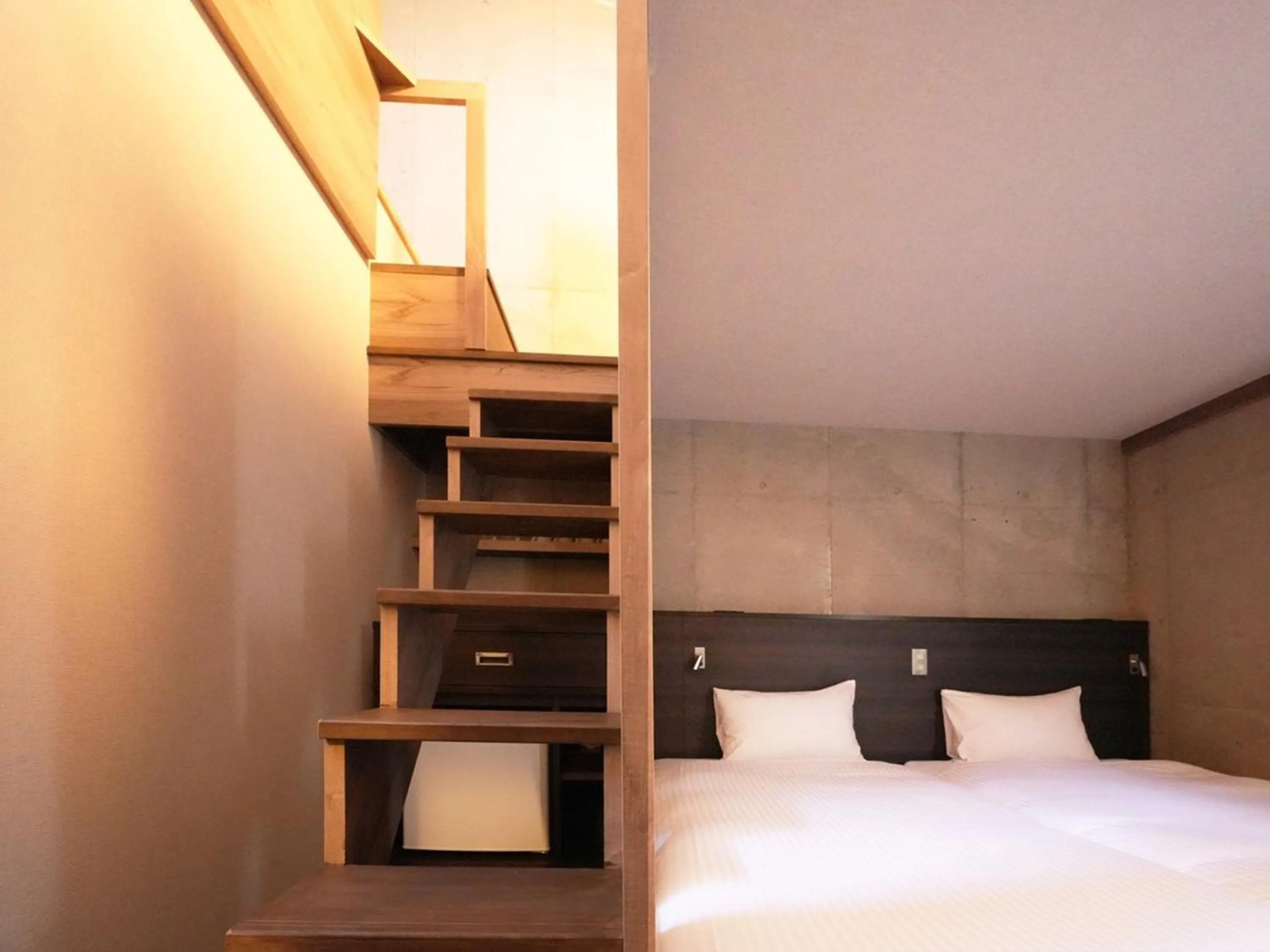 Photo of the whole room, Bed in The BREAKFAST HOTEL MARCHE Ishigaki Island