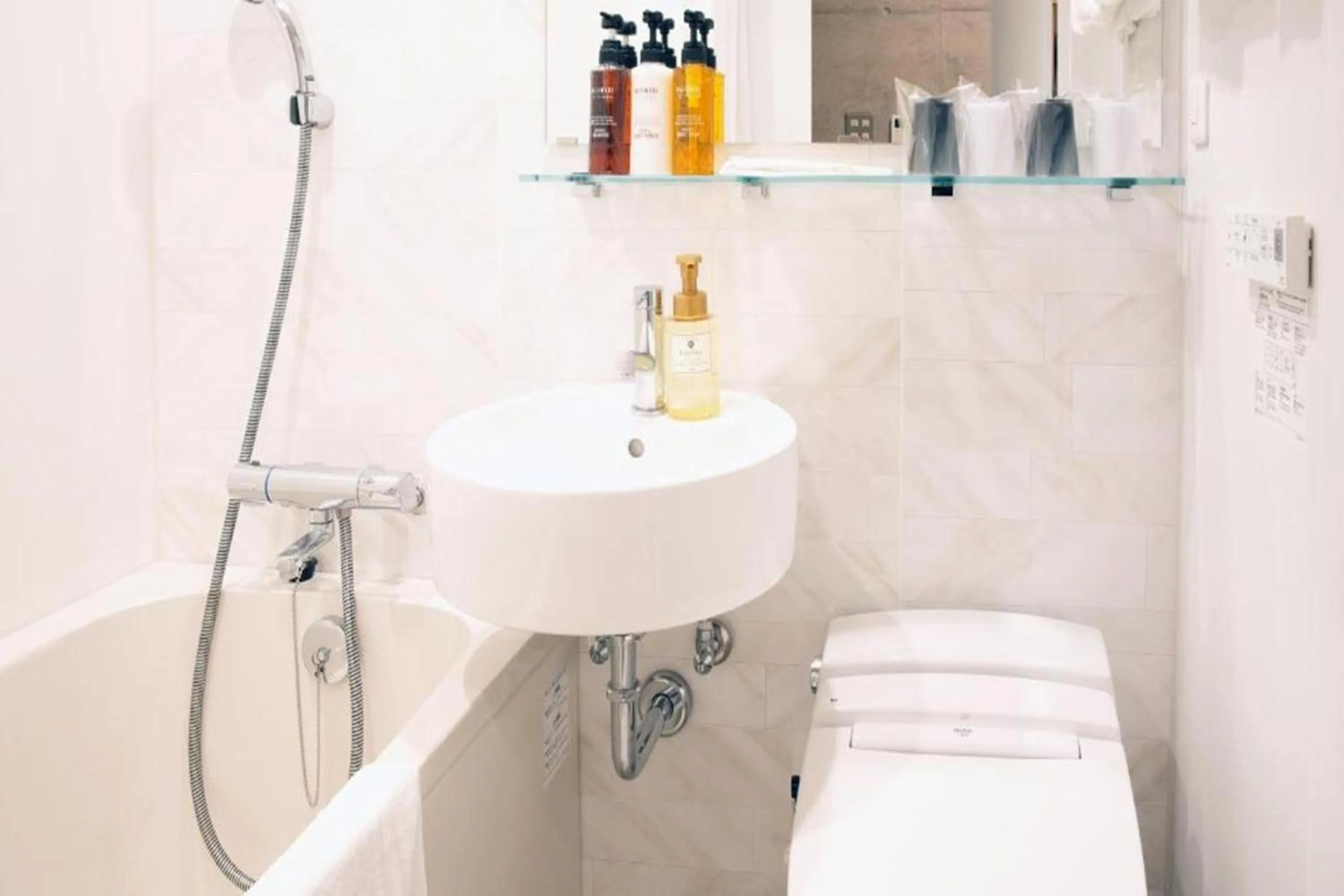 Shower in The BREAKFAST HOTEL MARCHE Ishigaki Island