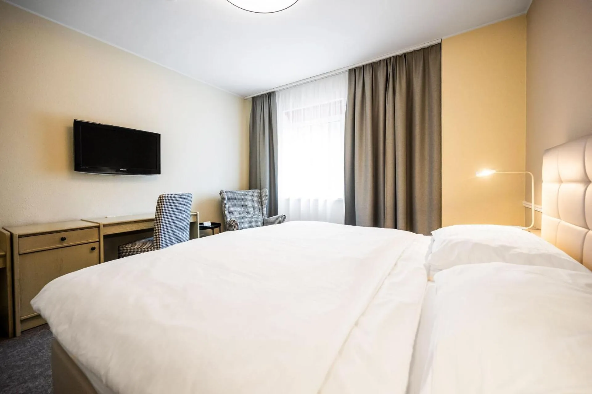 Bed in Motel Zeltweg - Self-Check-in