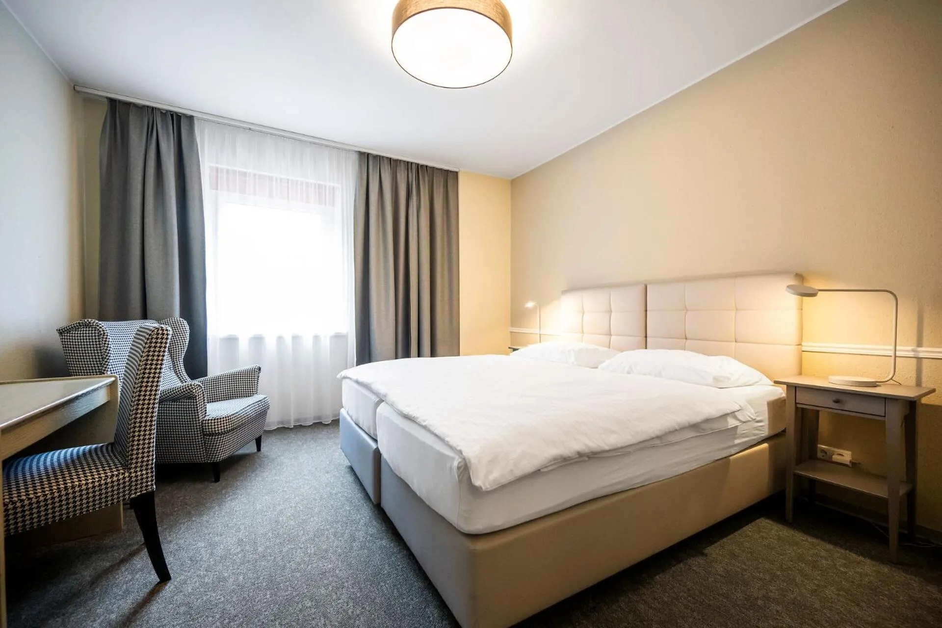 Bed in Motel Zeltweg - Self-Check-in