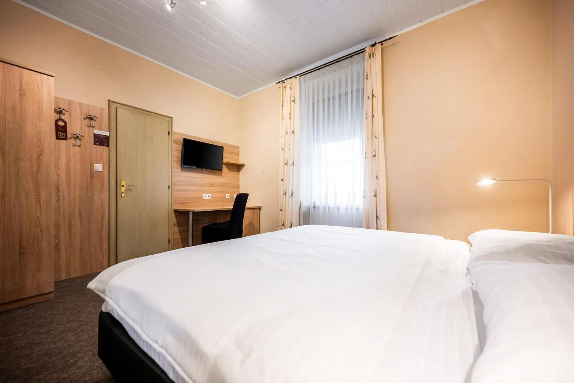 Bed in Motel Zeltweg - Self-Check-in