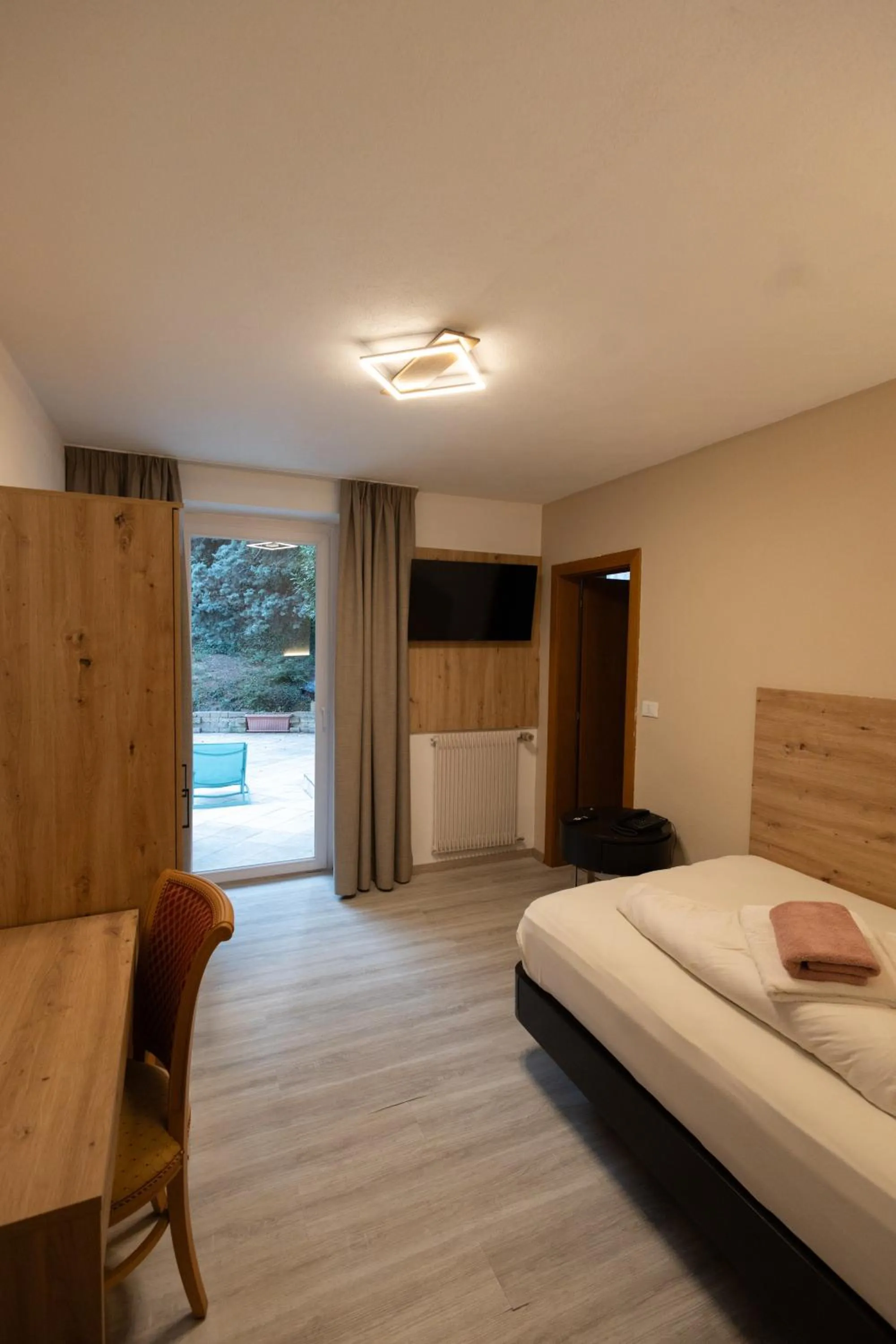 Bed in Hotel Marlingerhof