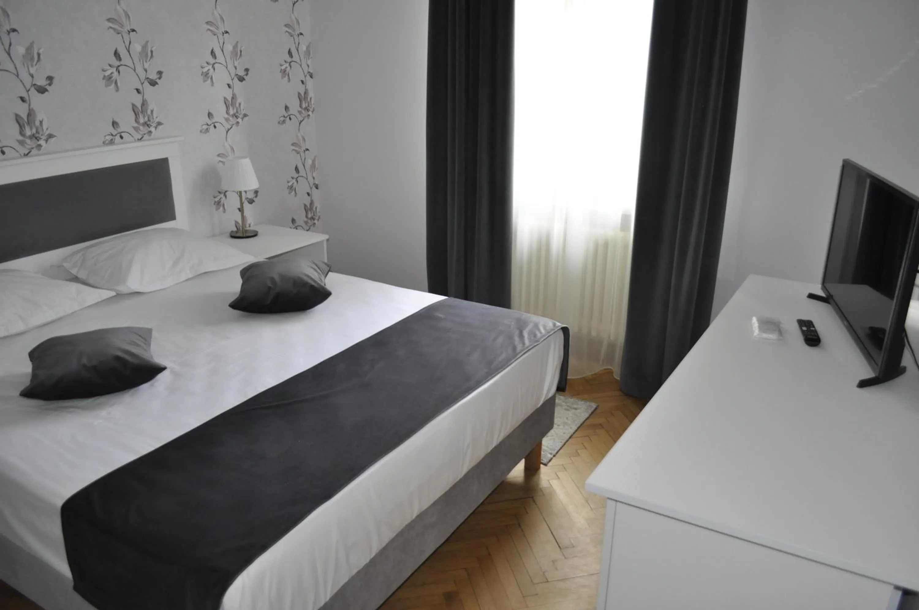 Photo of the whole room, Bed in Hotel Triumf