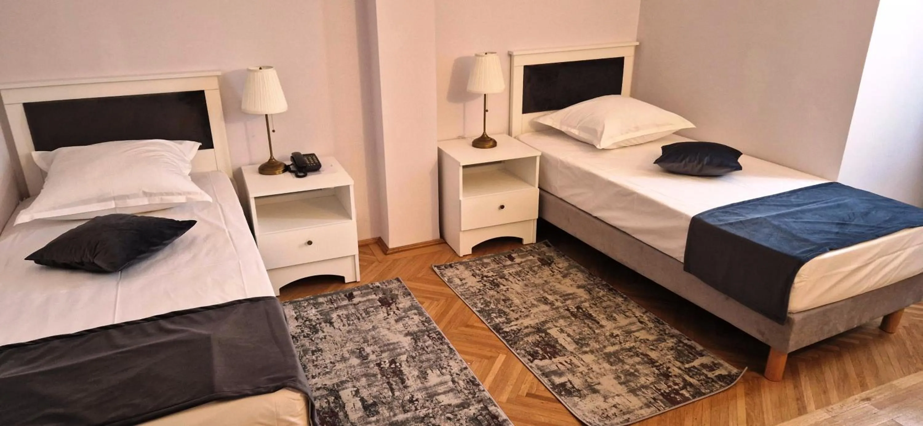 Bed in Hotel Triumf