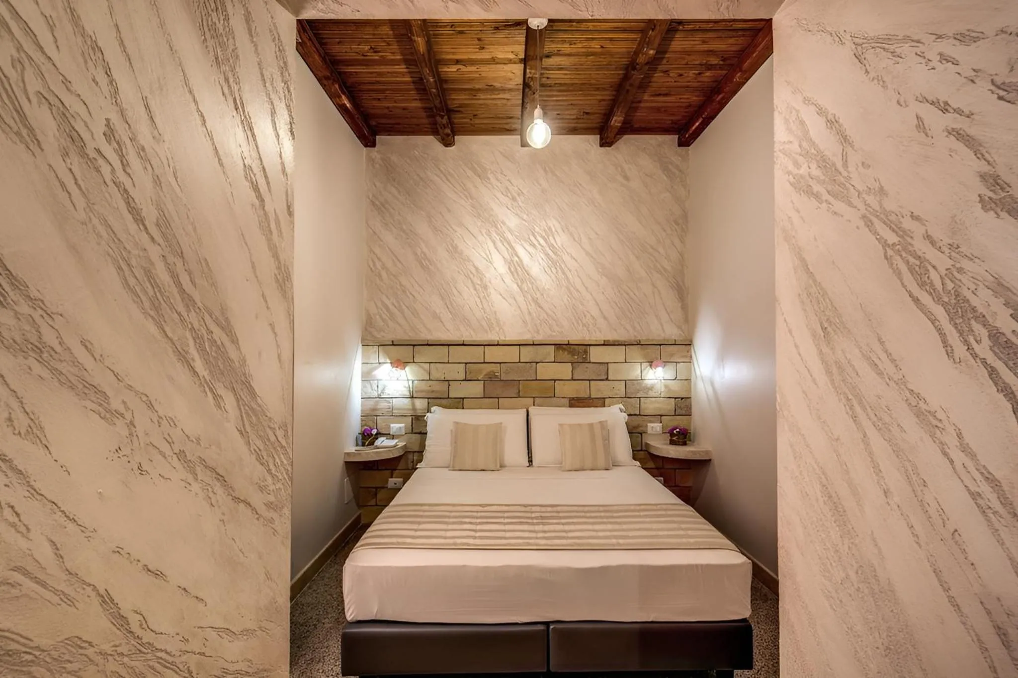 Bed in Colosseo Accomodation Room Guest House