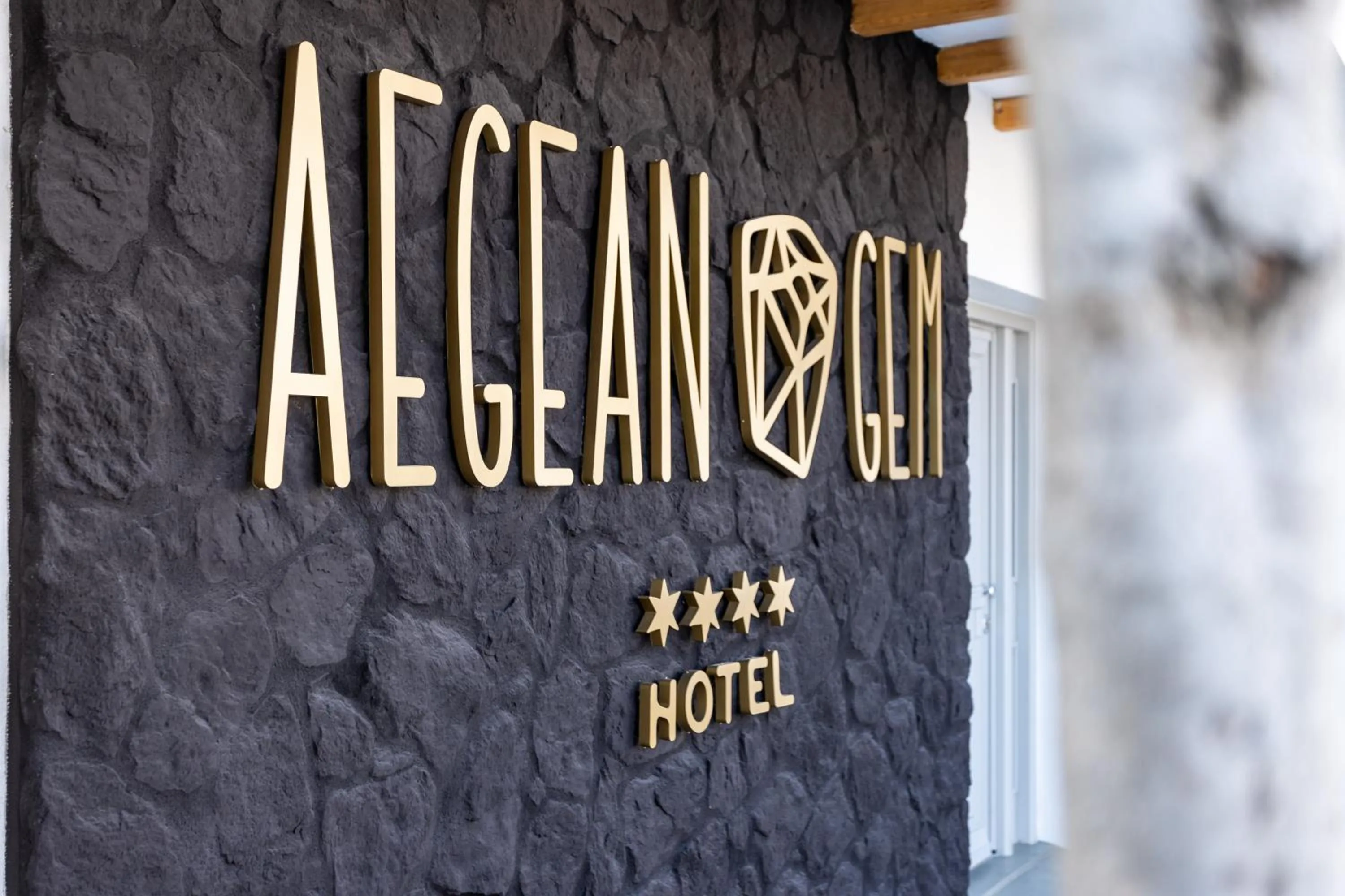 Property logo or sign in Aegean Gem