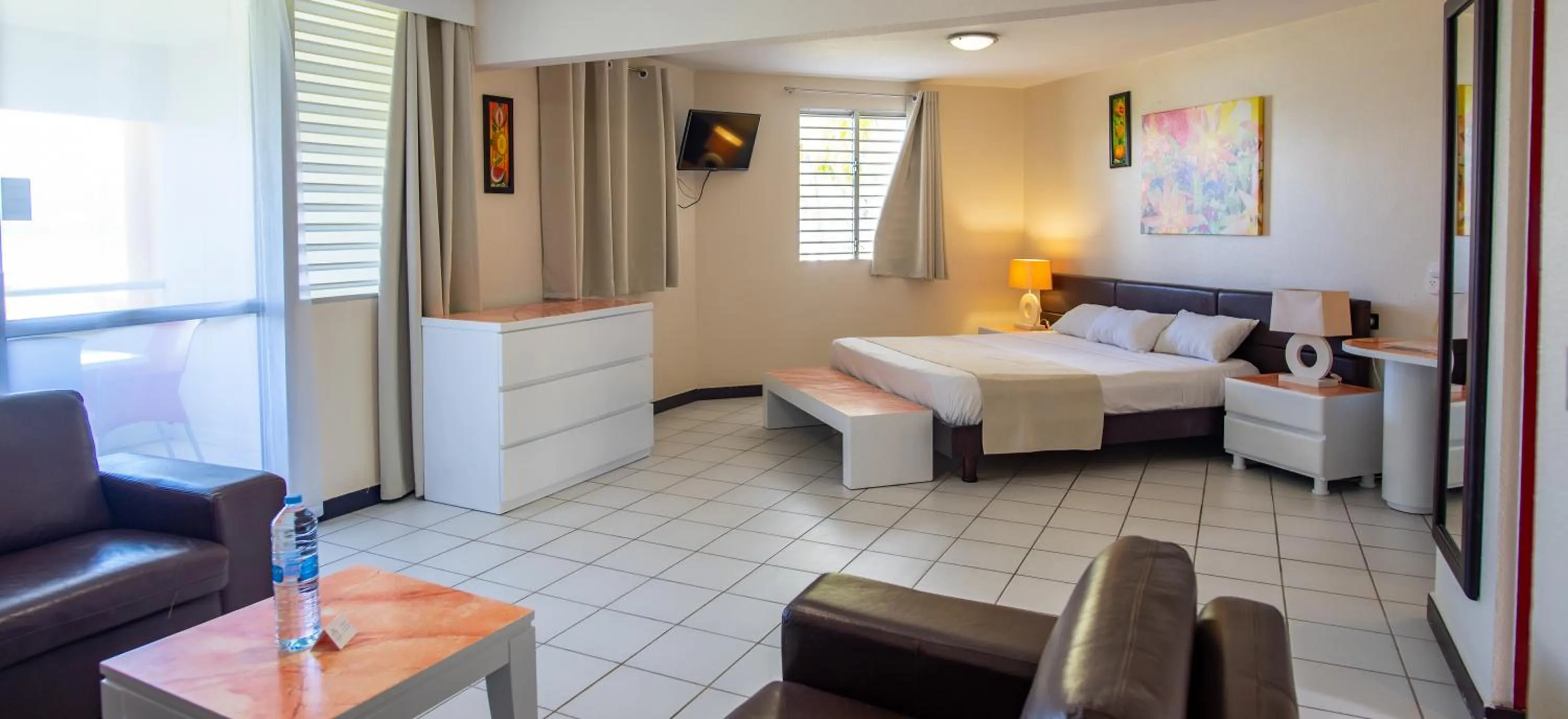 Seating area, Bed in Canella Beach Hotel