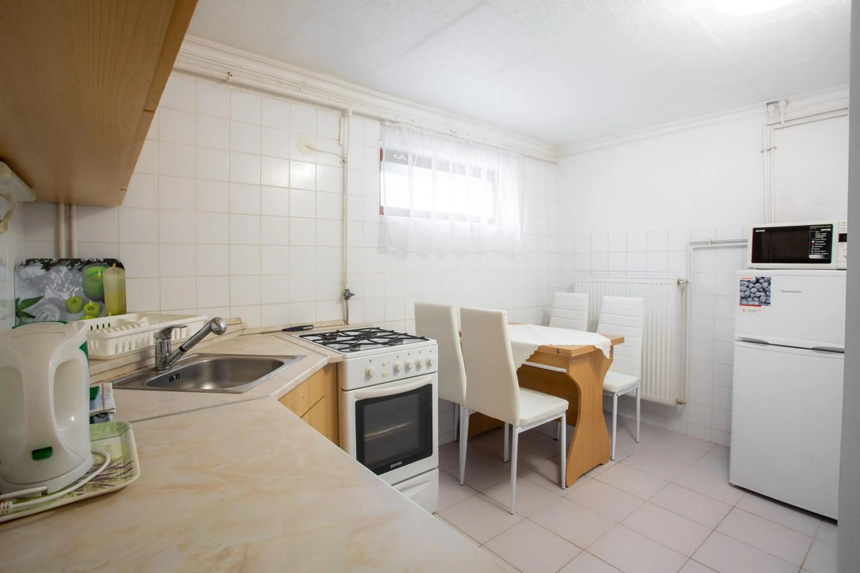 kitchen in Visegrád Vendégház-Apartman