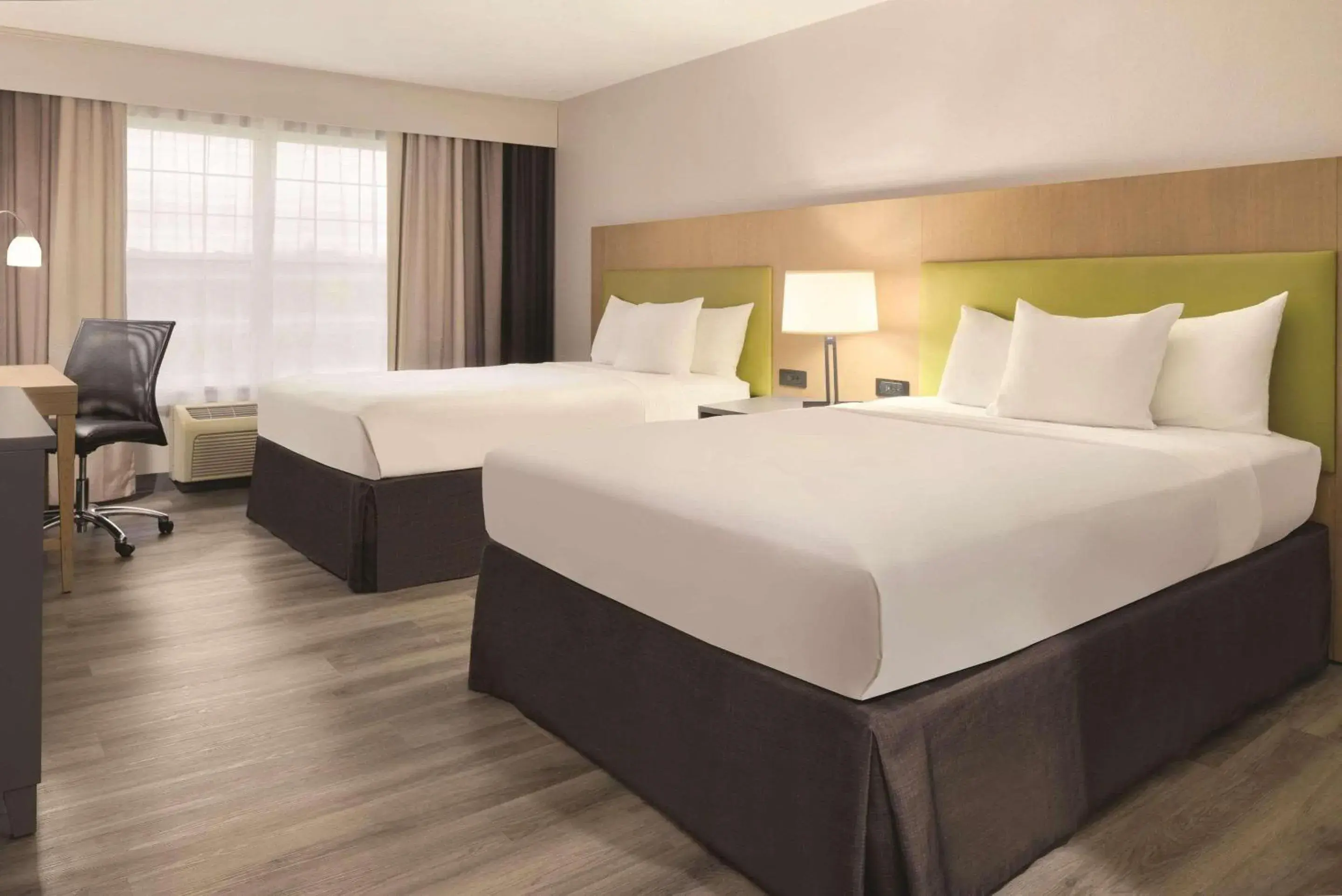 Bedroom, Bed in Country Inn & Suites by Radisson, Cedar Falls, IA Bedroom, Bed in Country Inn & Suites by Radisson, Cedar Falls, IA