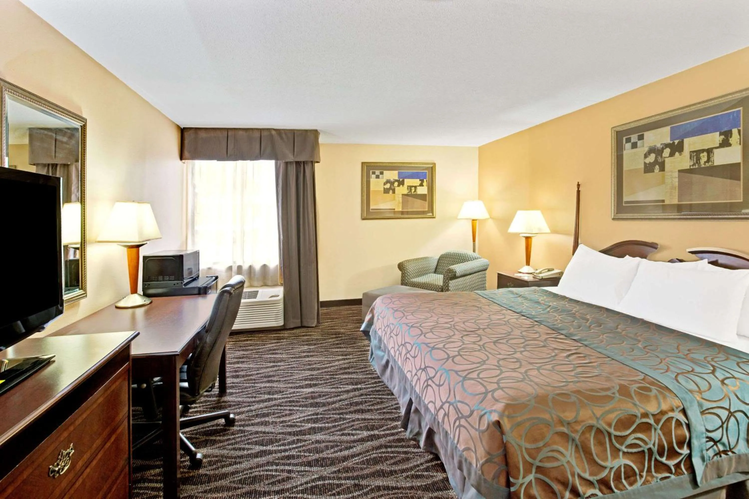 Photo of the whole room, Bed in Ramada by Wyndham Statesville