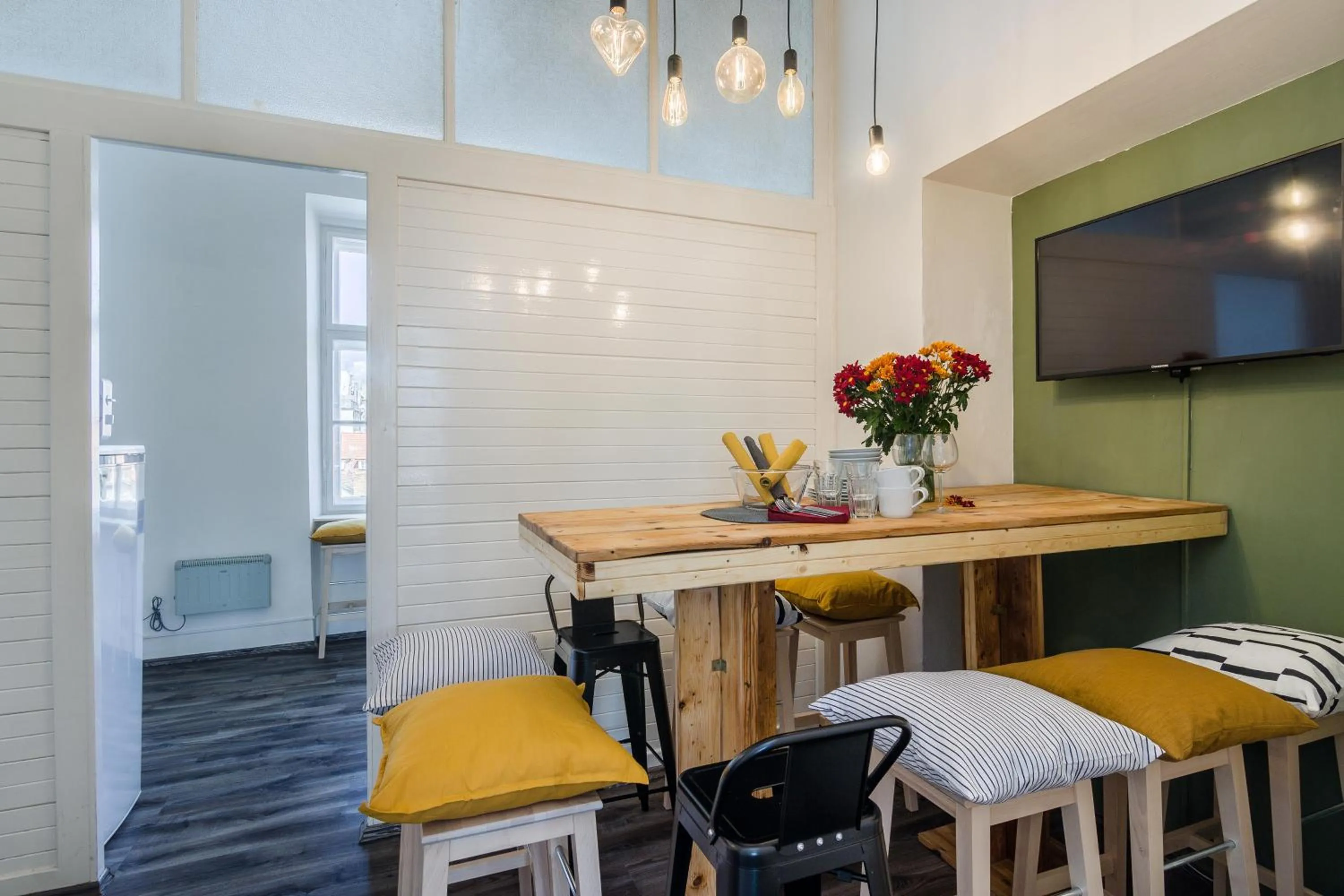 Dining area in Historic Centre Prague Apartments by Michal&Friends