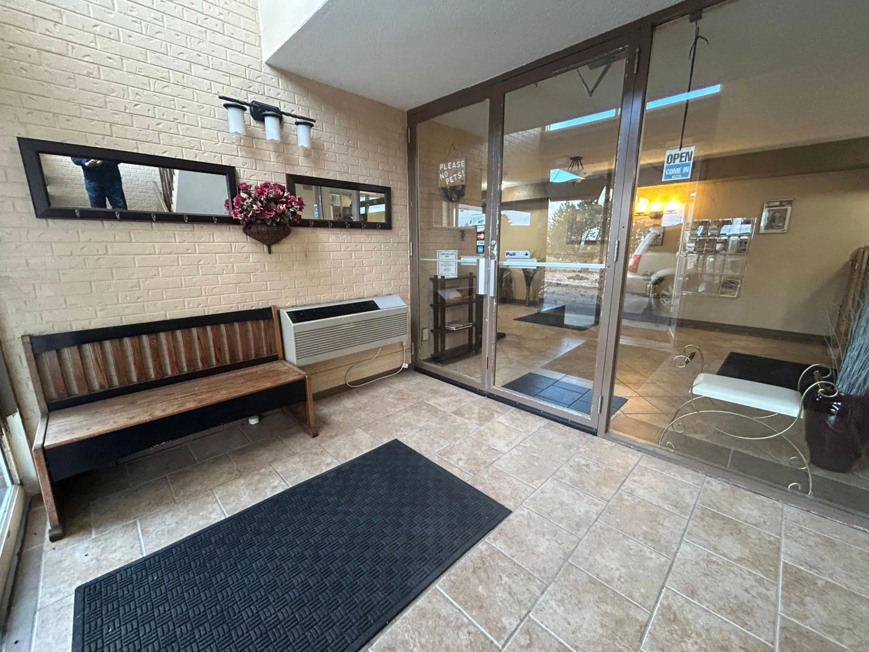 Seating area, Bed in Candlelight Inn by Capital O Scottsbluff