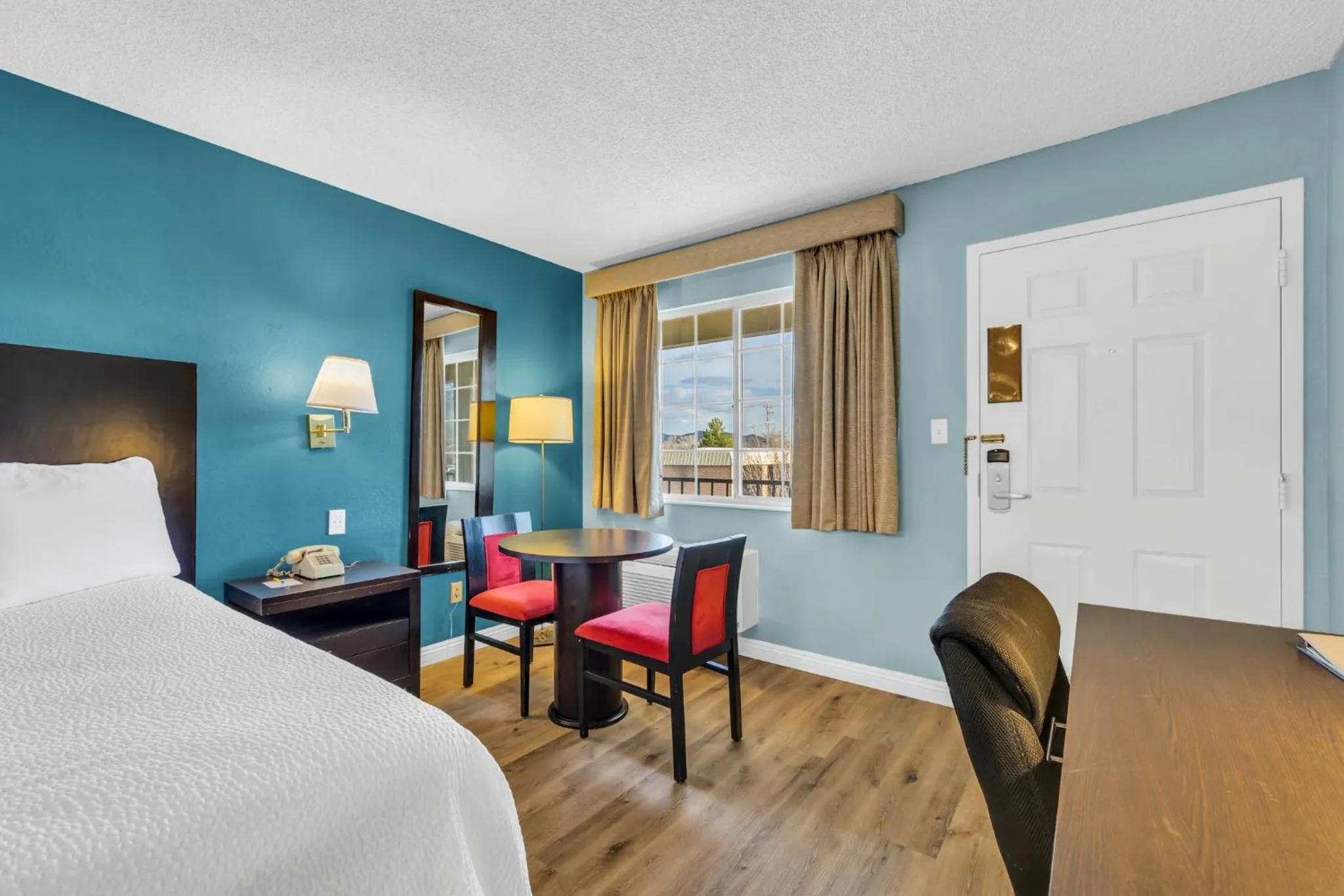 Seating area, Bed in Days Inn by Wyndham Carson City