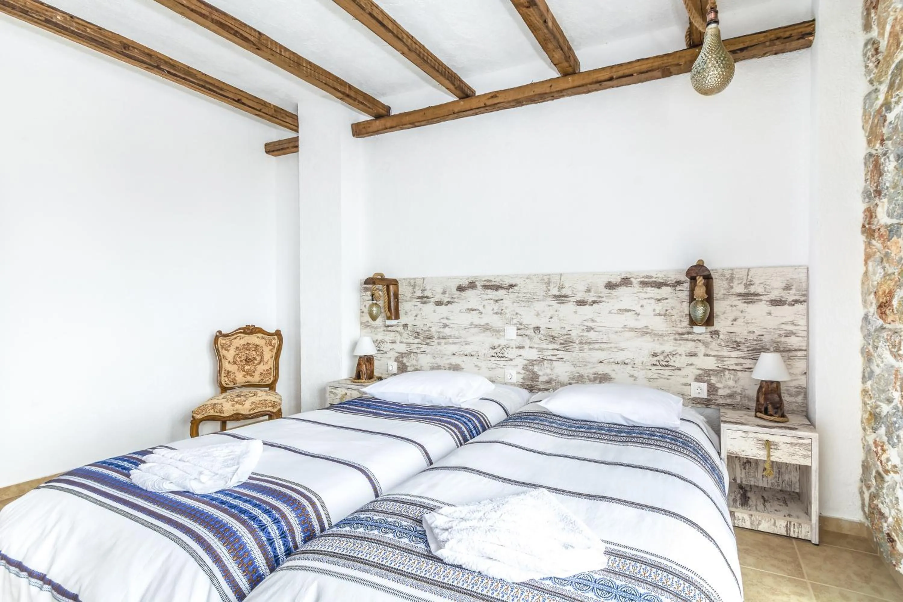 Bed in Limeri Traditional Guest House