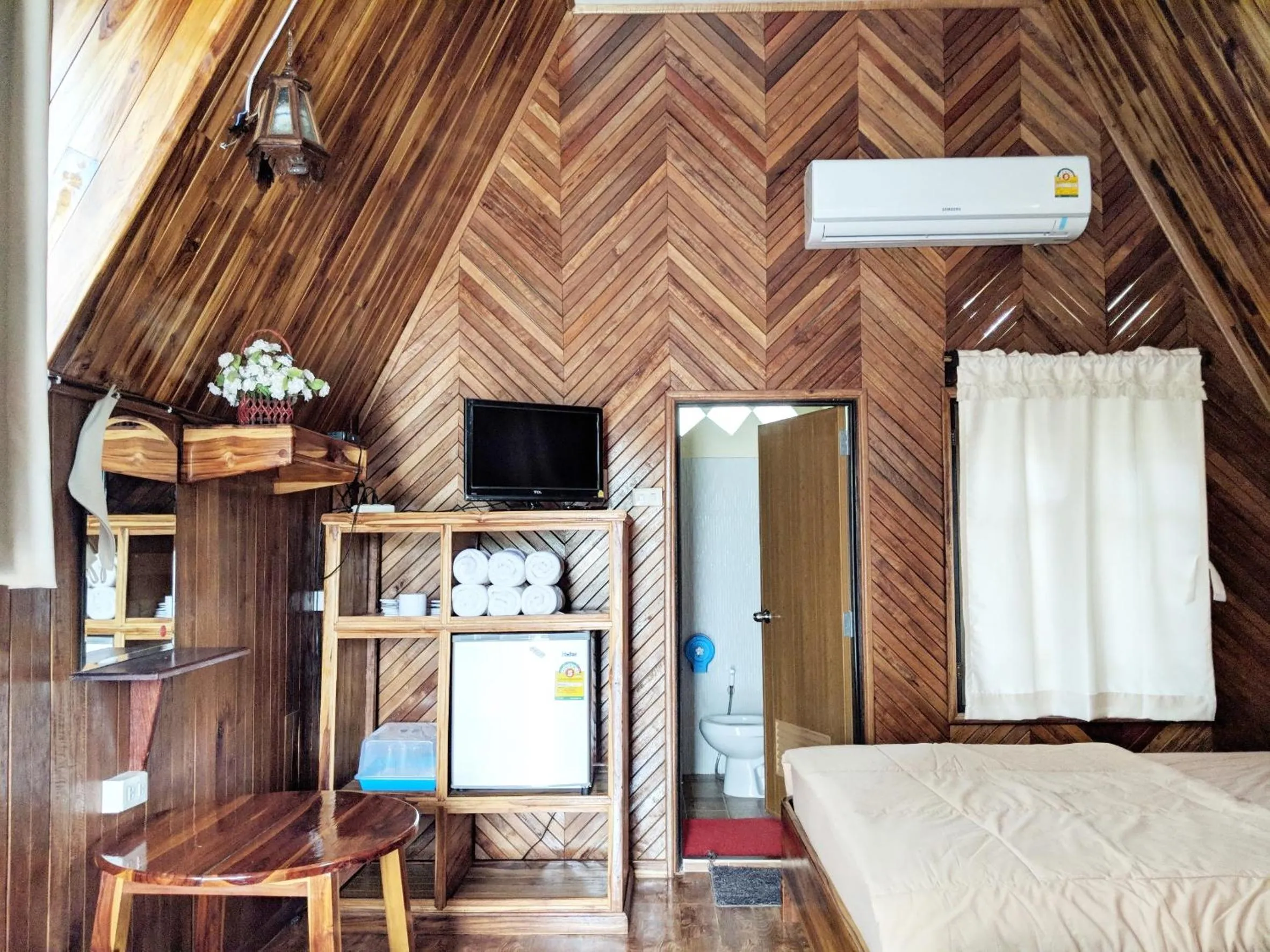 Bed in Bansuanphuhong Resort
