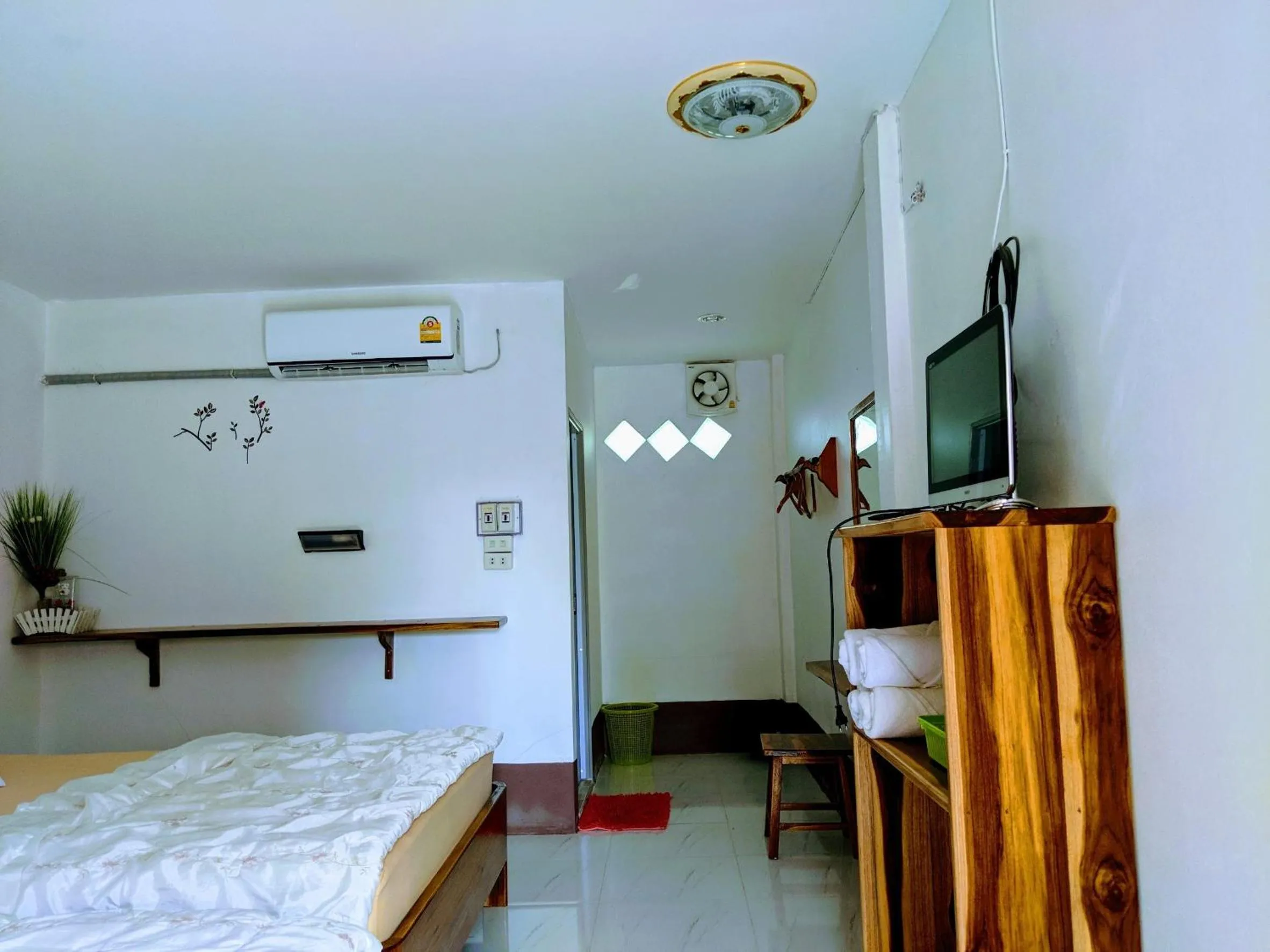 Bed in Bansuanphuhong Resort