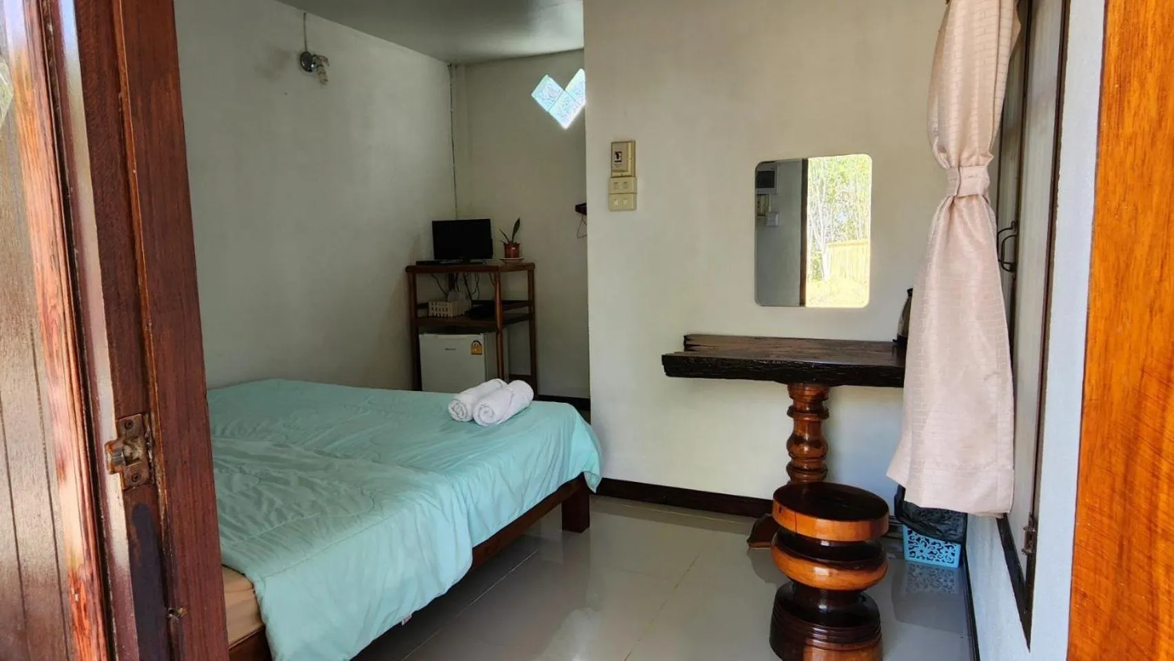 Bed in Bansuanphuhong Resort