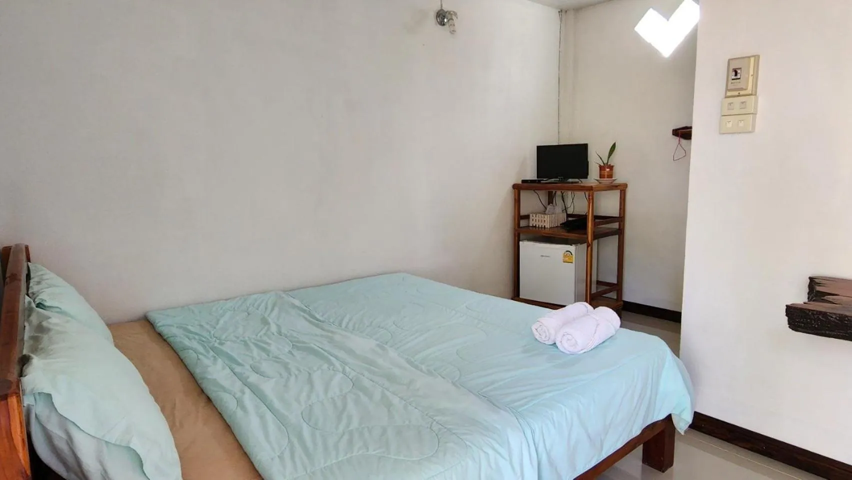 Bed in Bansuanphuhong Resort