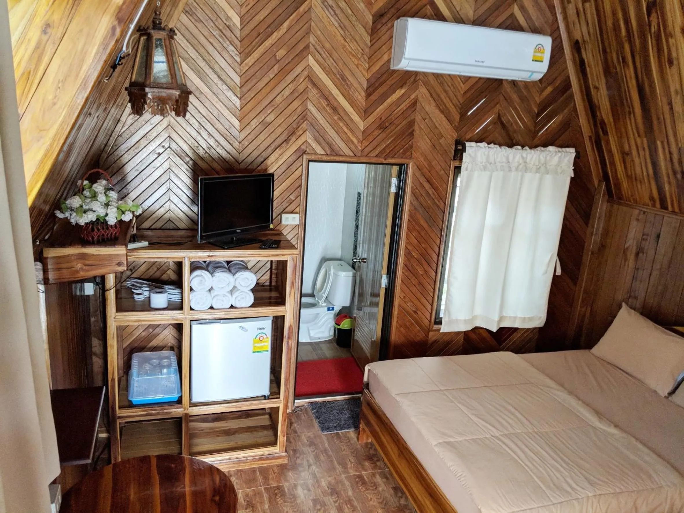 Bed in Bansuanphuhong Resort