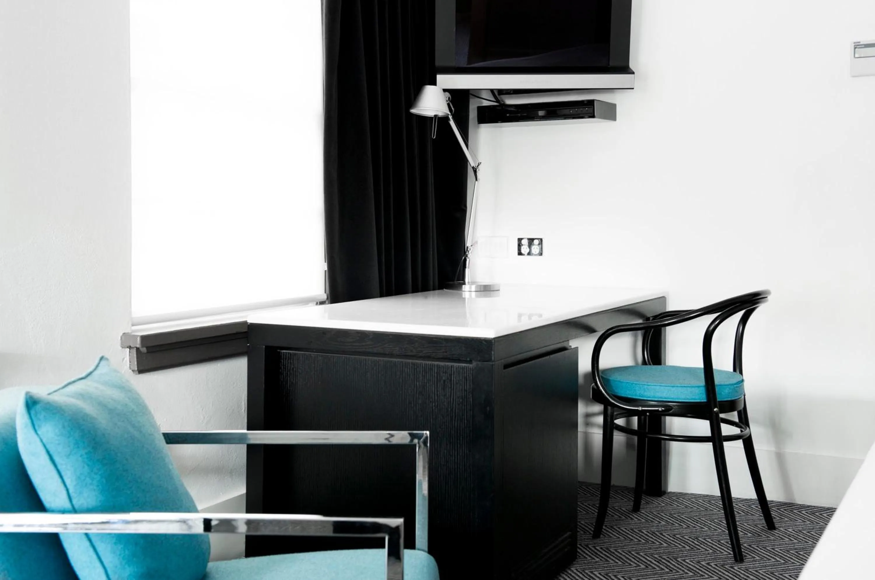 Bed in Peppers Gallery Hotel