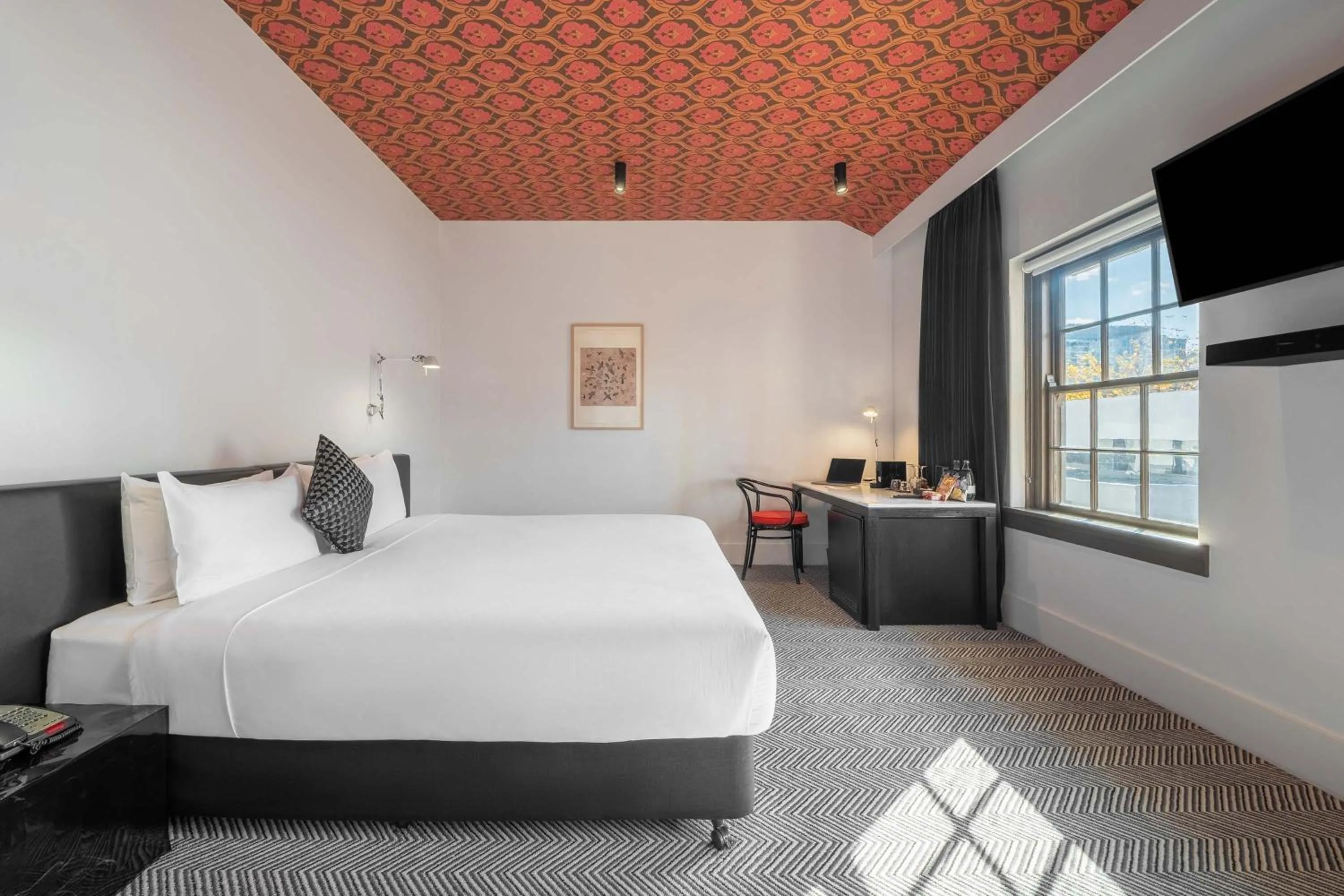 Bed in Peppers Gallery Hotel