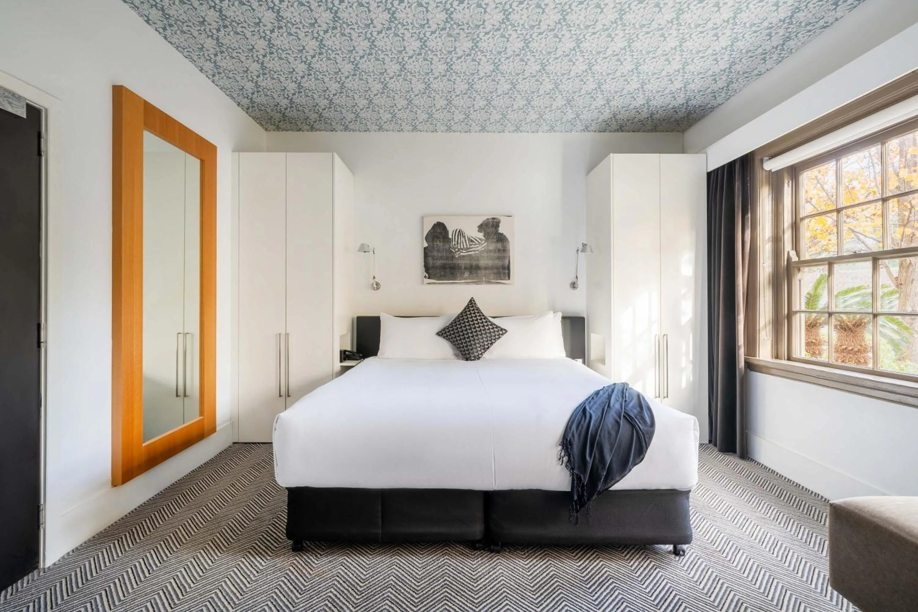 Bed in Peppers Gallery Hotel