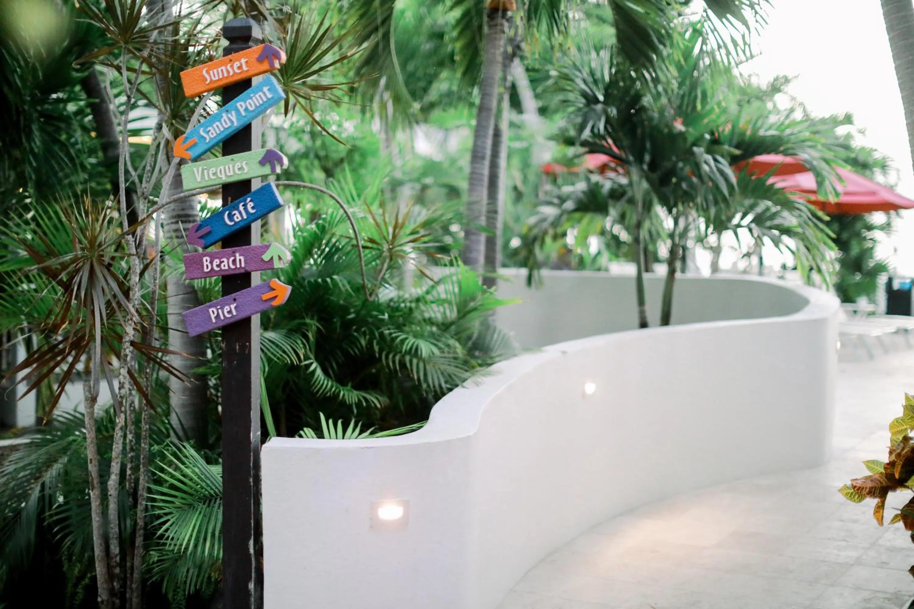 Property logo or sign in Sand Castle on the Beach - Adults Only