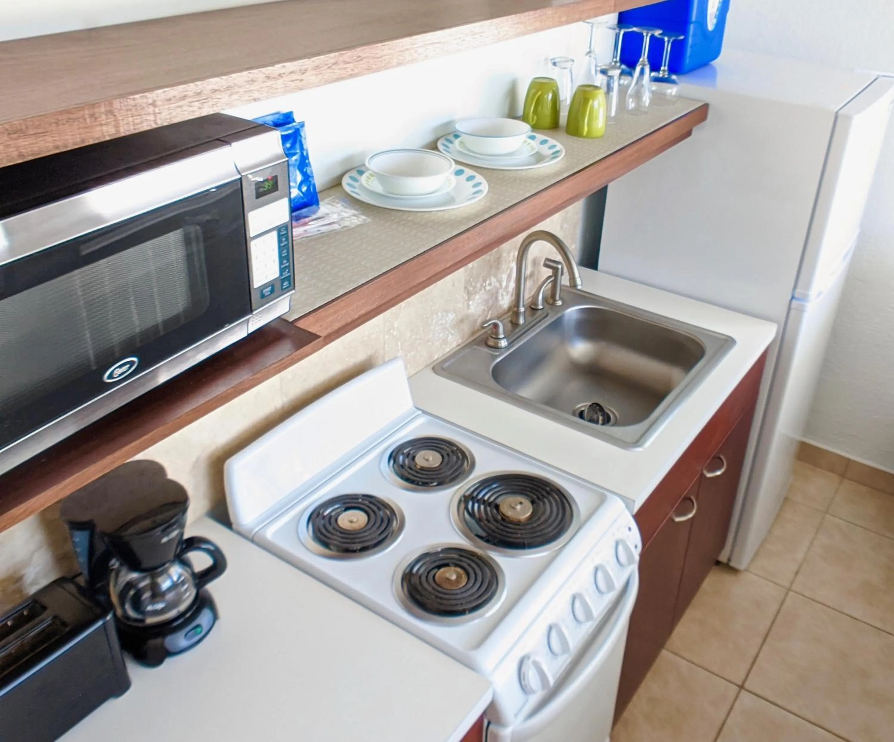 Kitchen or kitchenette in Sand Castle on the Beach - Adults Only