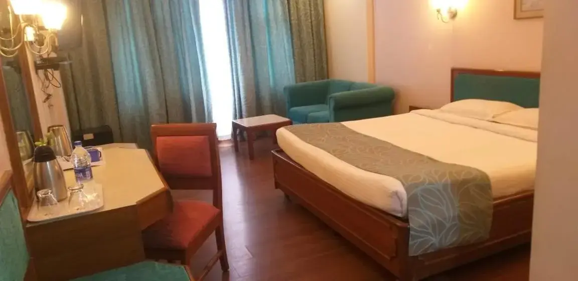 Deluxe Queen Room in Maya's Kings Kourt Deluxe Queen Room in Maya's Kings Kourt