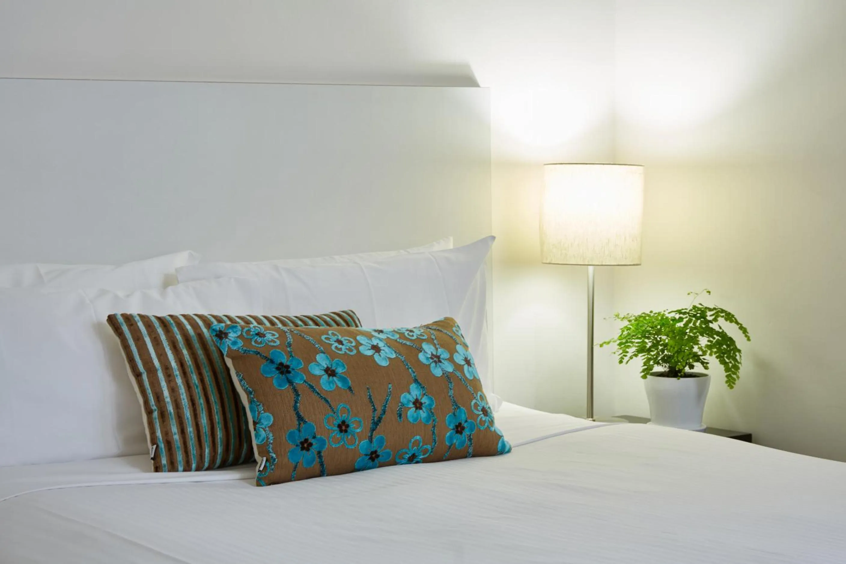 Bed in Cosmopolitan Hotel and Apartments